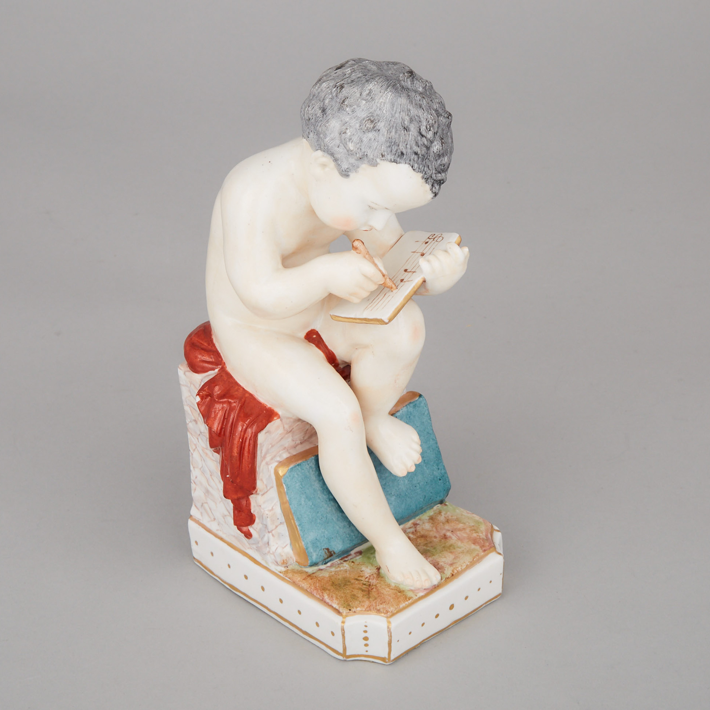'Naples' Bookend Figure of a Seated Scholar, early 20th century