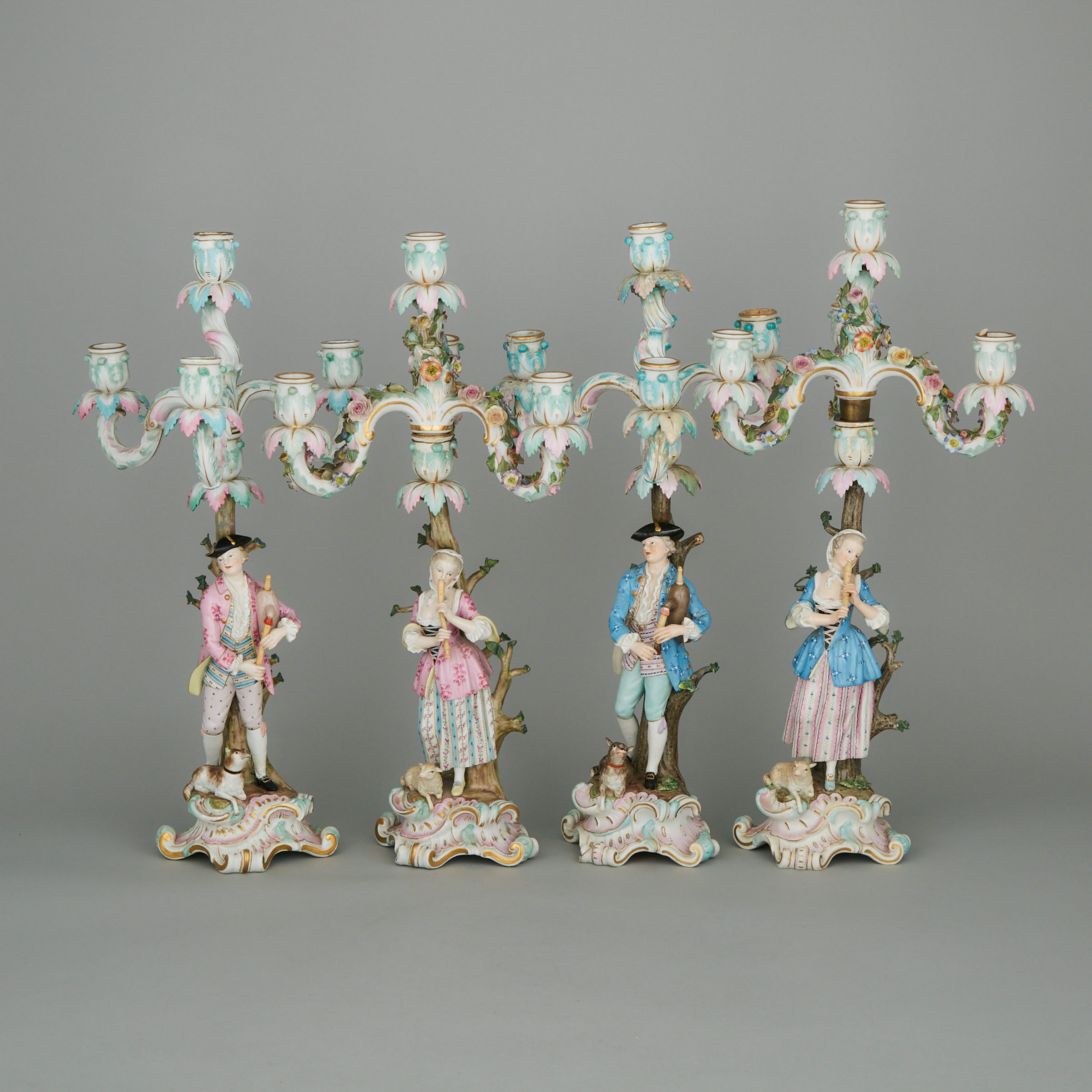 Two Pairs of Meissen Shepherd and Shepherdess Four-Light Candelabra, late 19th century