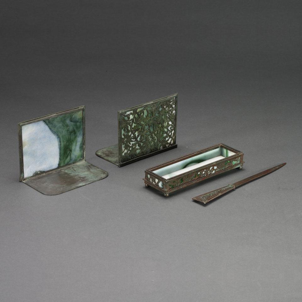 Apollo Studios Patinated Metal and Green Slag Glass Desk Set, early 20th century