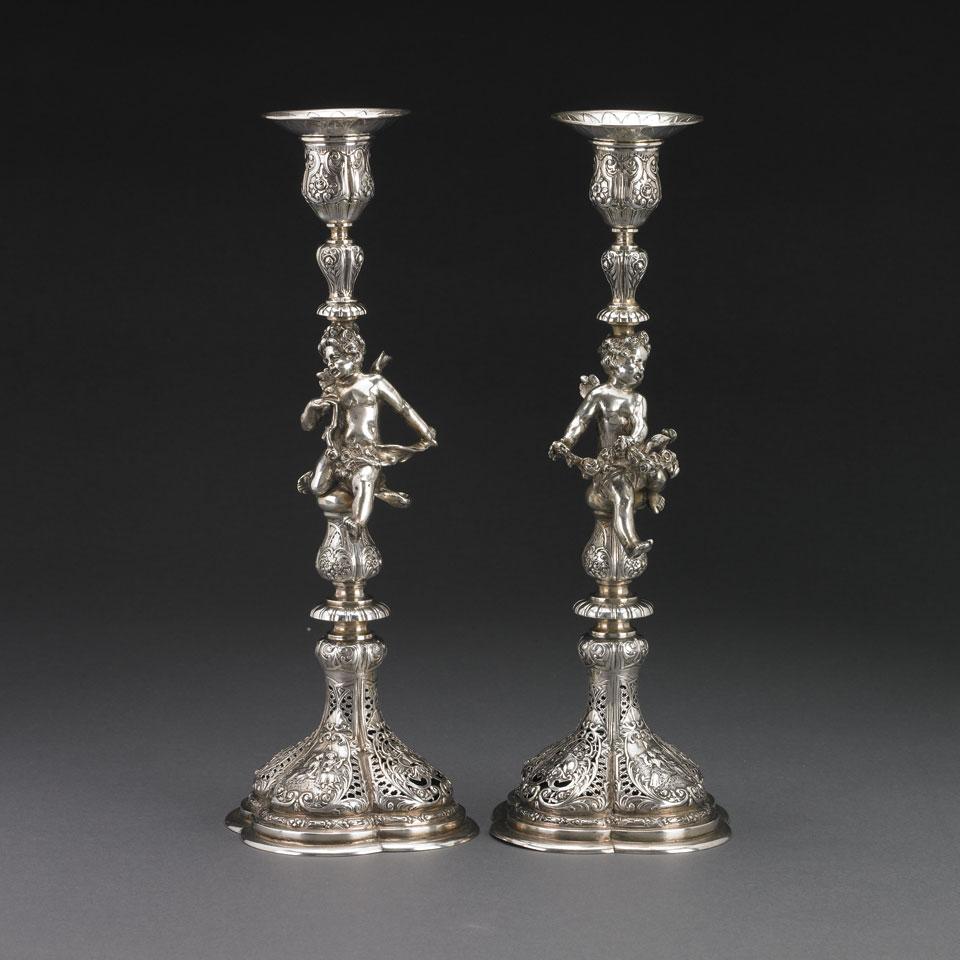 Pair of Continental Silver Figural Candlesticks, probably German, late 19th century