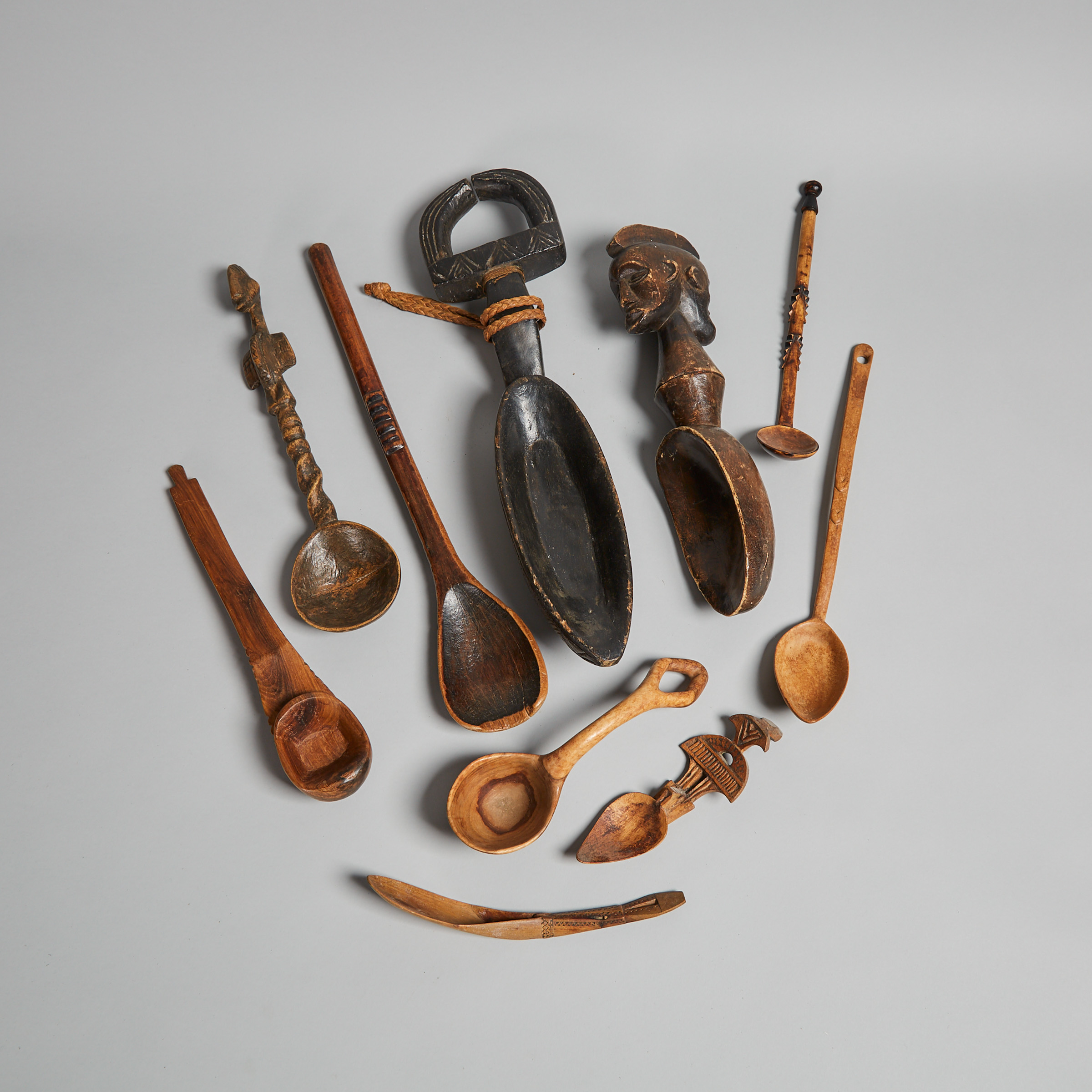 Group of Ten Carved Wood African Spoons