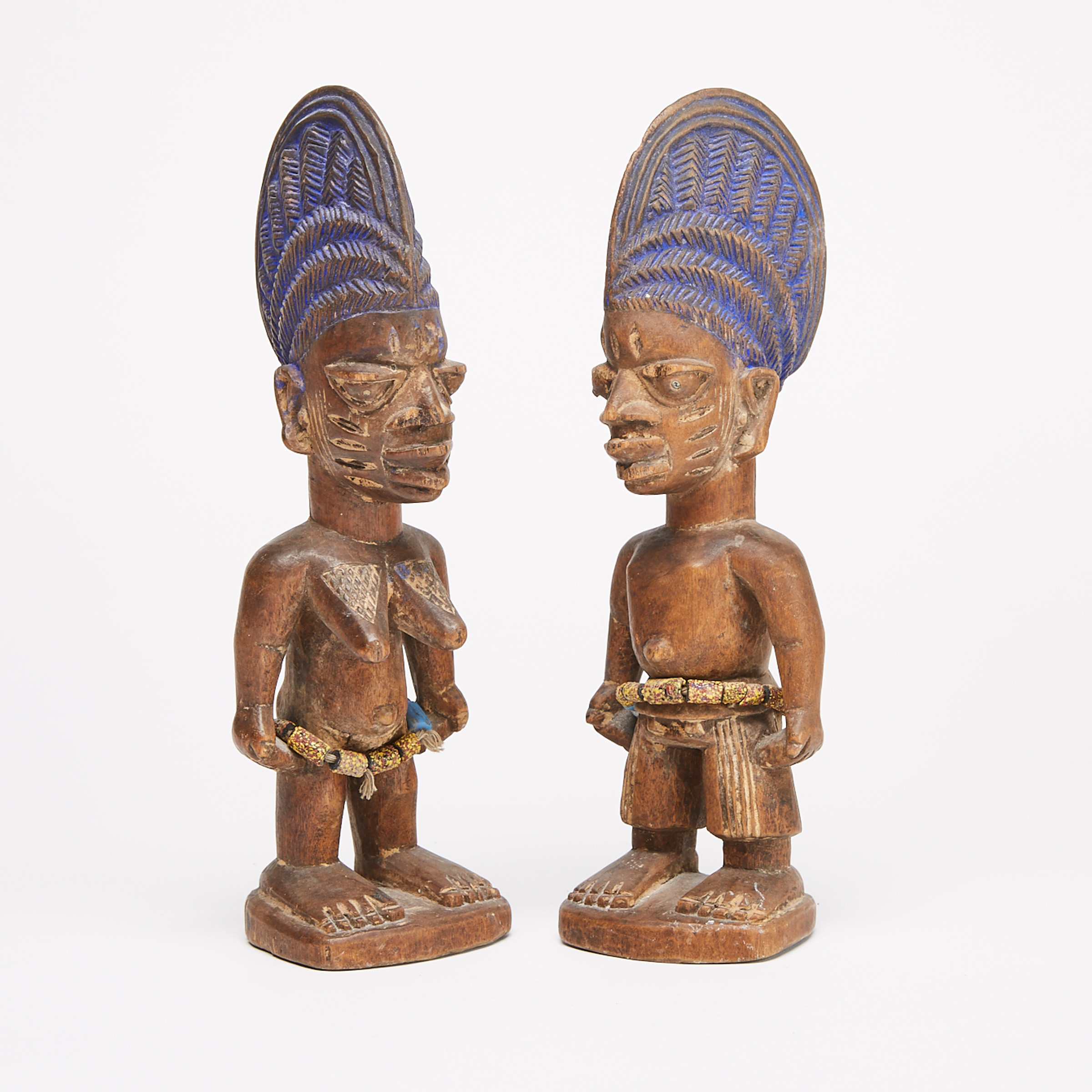 A Pair of Yoruba Ibeji Male and Female Twin Figures, Nigeria, West Africa