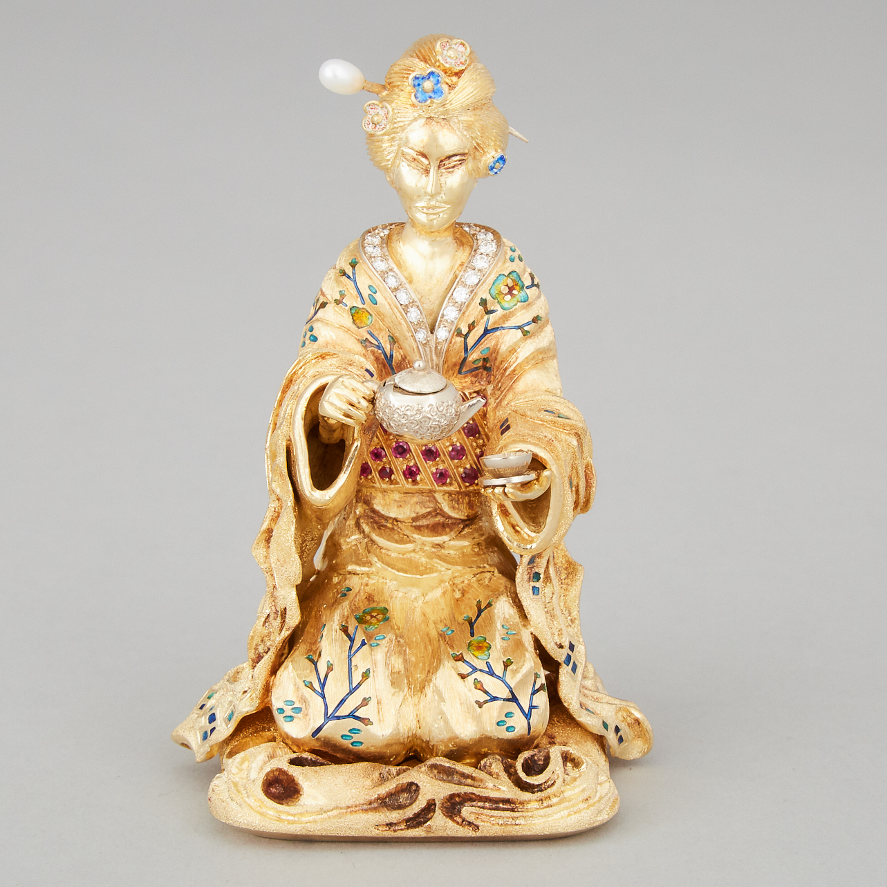 Eastern Gem-Set and Enameled Yellow and White Gold Figure of a Geisha, 20th century
