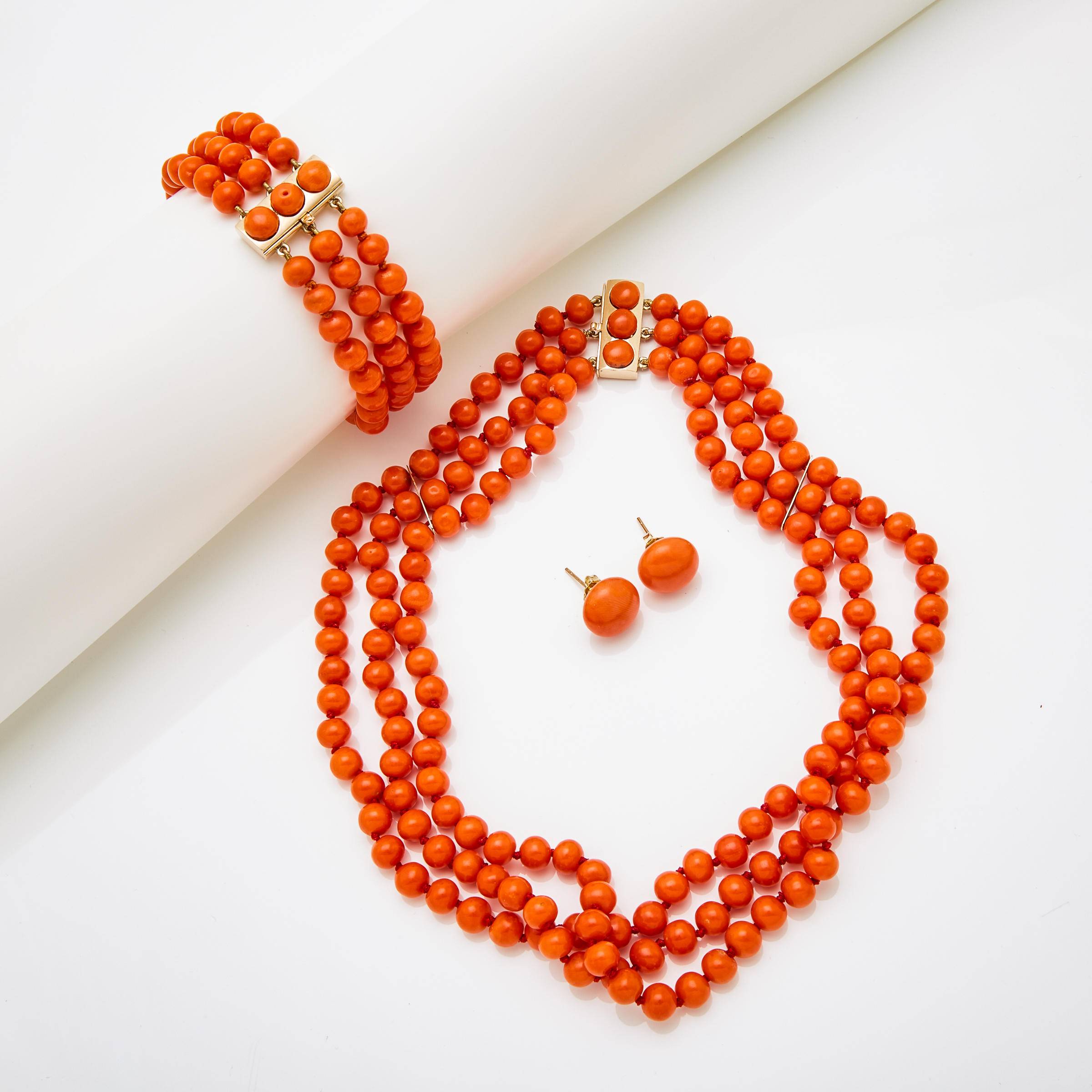 Triple Strand Coral Bead Necklace And Bracelet