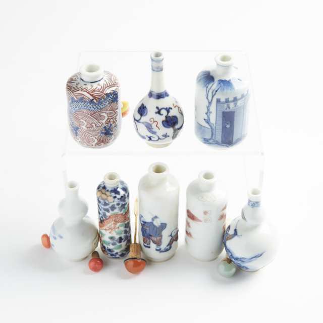 A Group of Eight Underglazed-Decorated Porcelain Snuff Bottles, 19th/20th Century