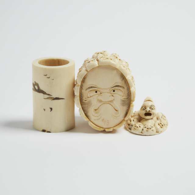 An Ivory Brushpot and 'Japanese Masks' Covered Box, Meiji Period