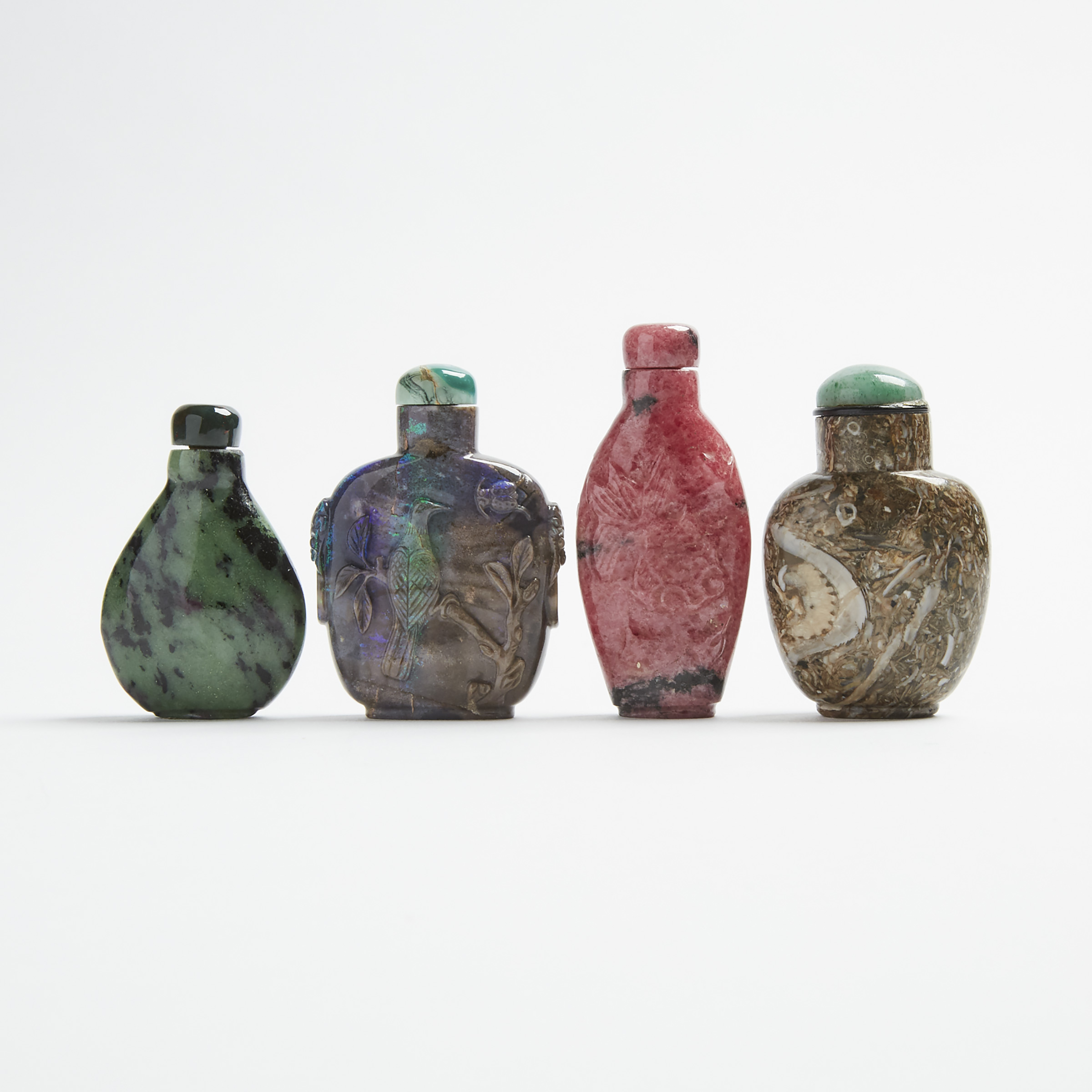 A Group of Four Stone Carved Snuff Bottles, 19th/20th Century