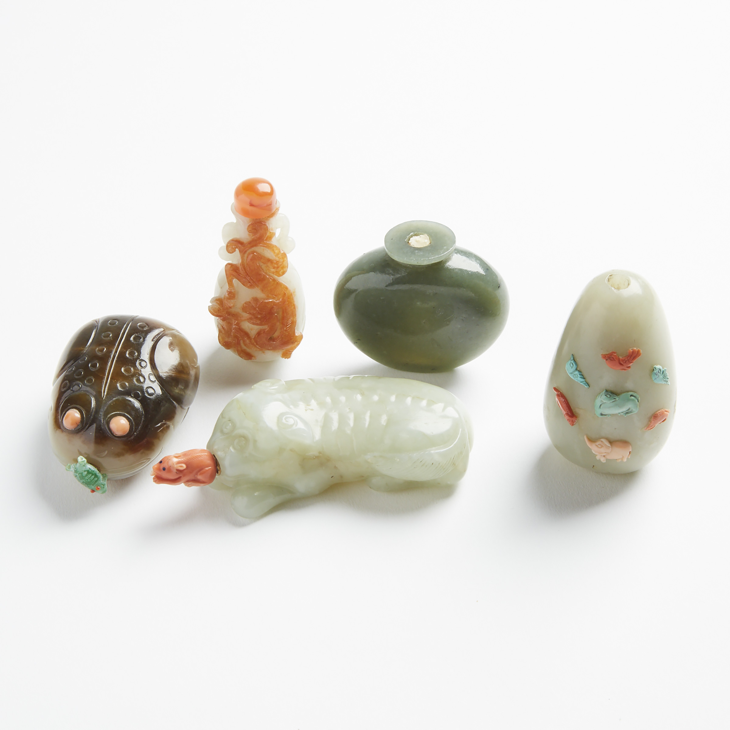 A Group of Five Jade Snuff Bottles, 19th/20th Century