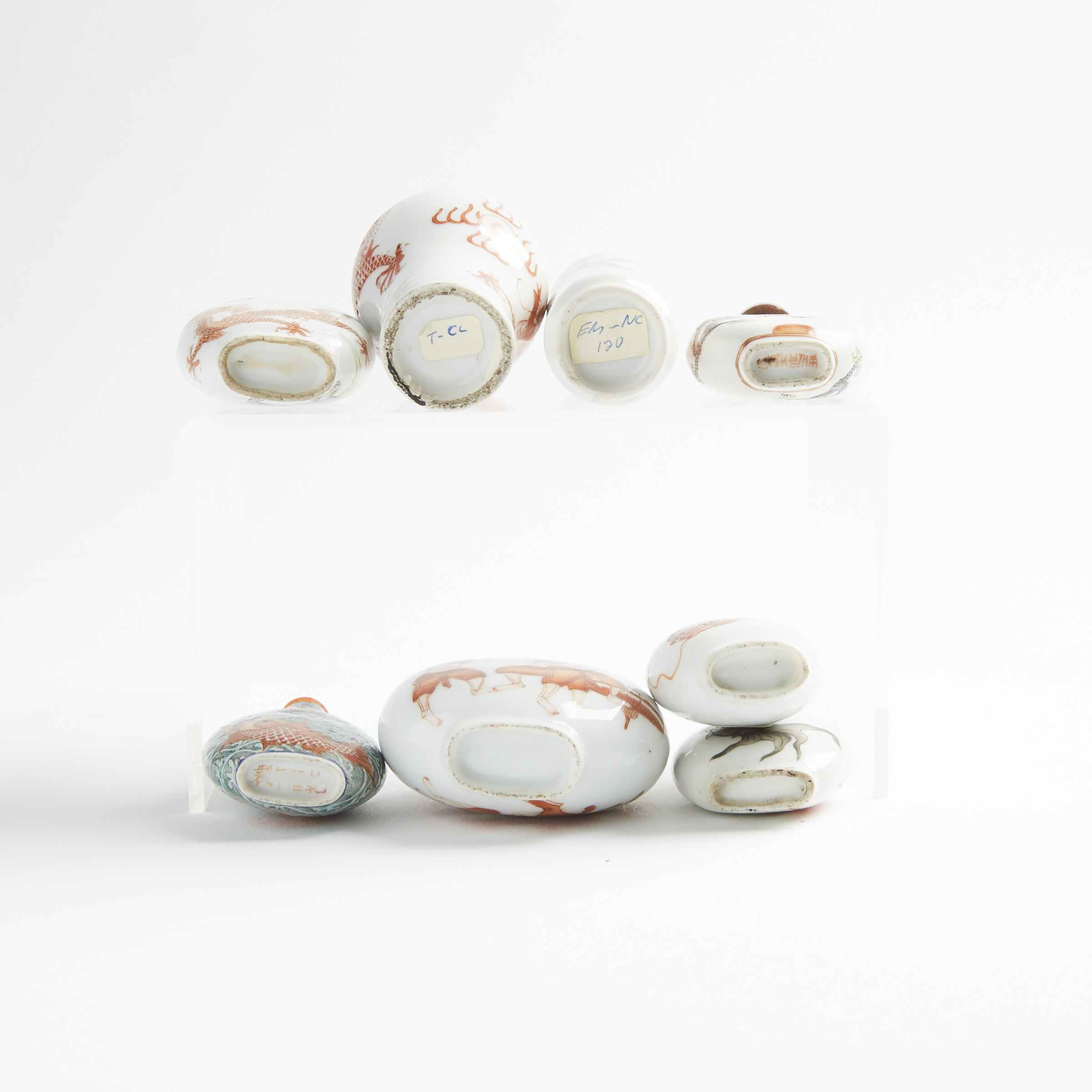 A Group of Eight Iron-Red Decorated Porcelain Snuff Bottles, 19th/20th Century
