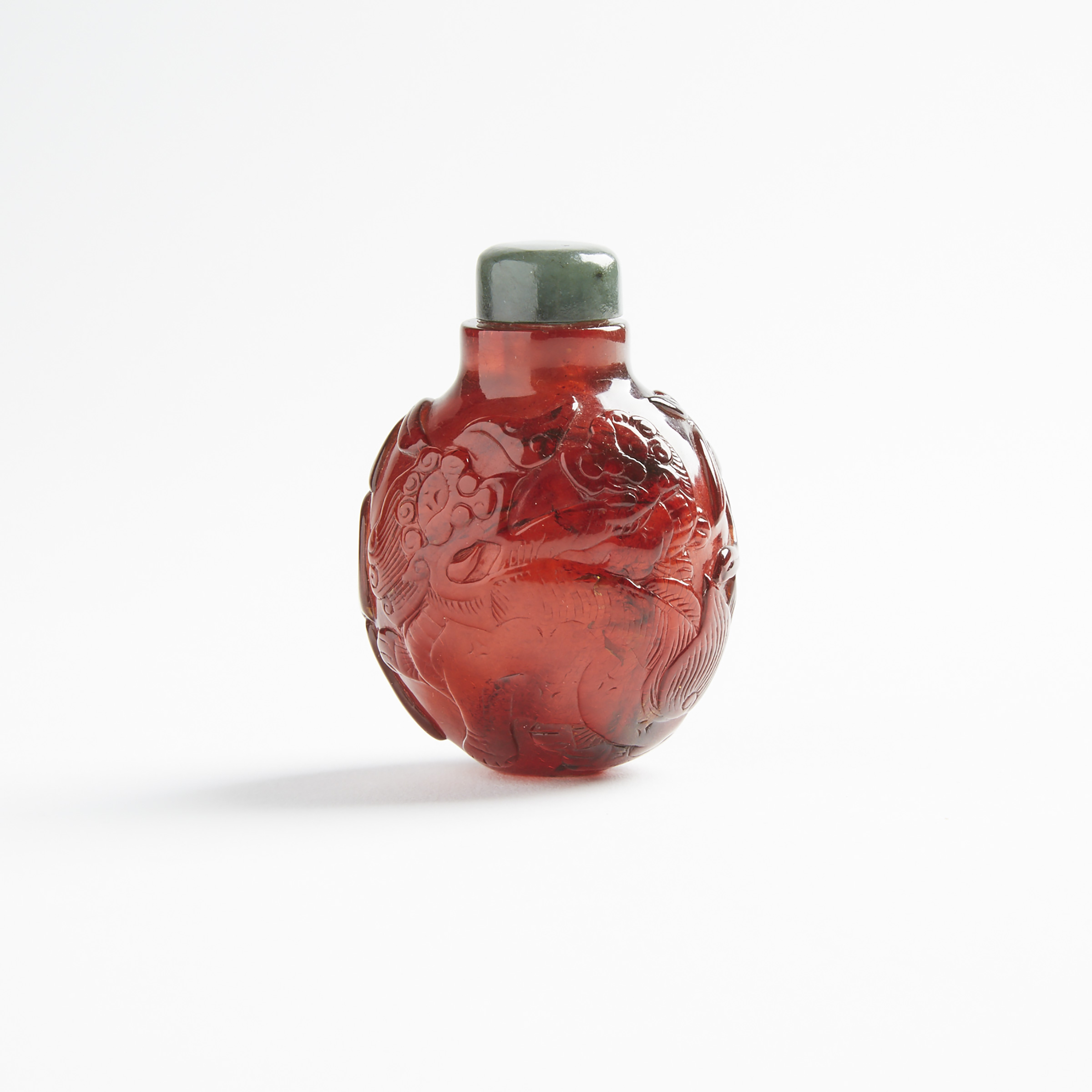 A Carved Amber Snuff Bottle, Late Qing Dynasty