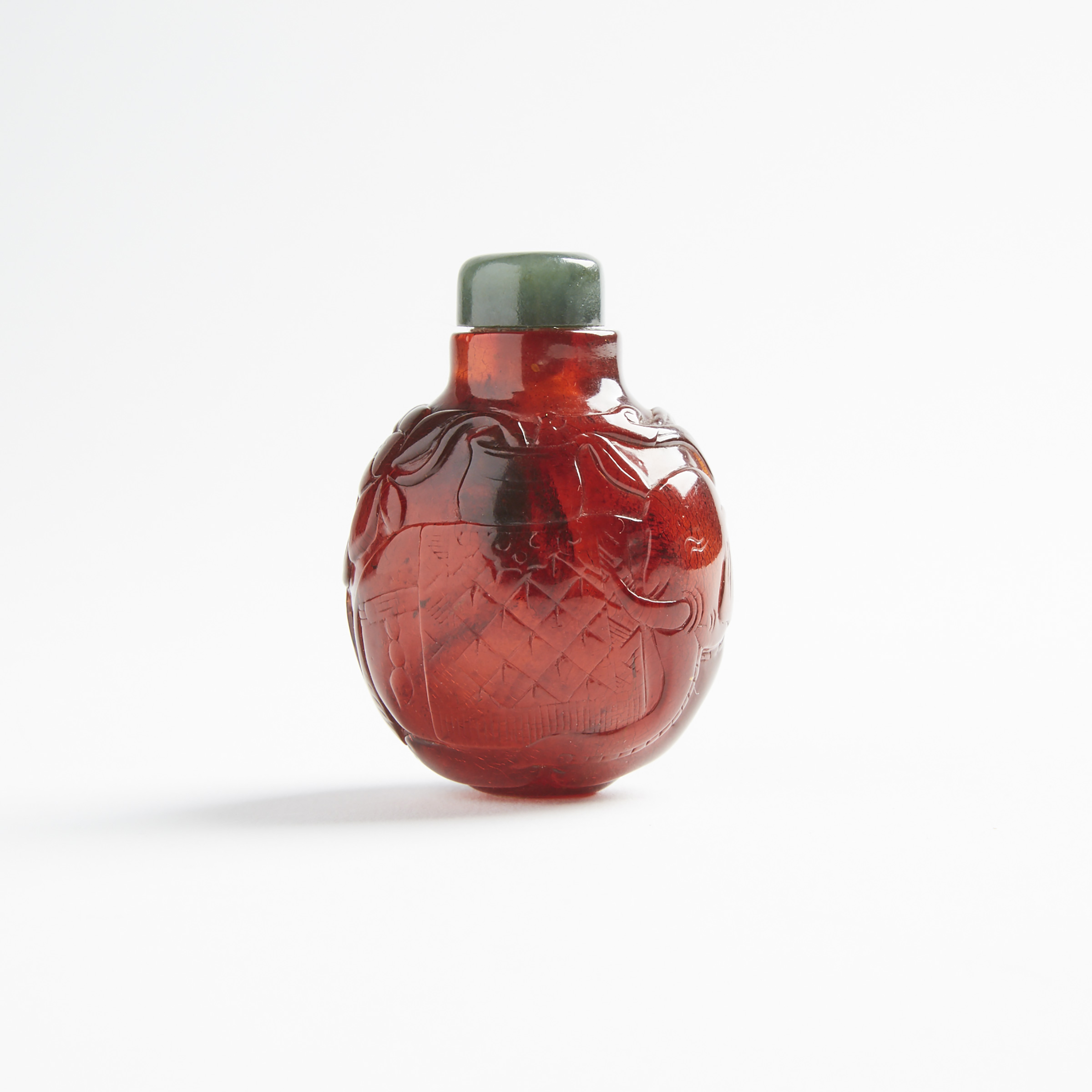 A Carved Amber Snuff Bottle, Late Qing Dynasty