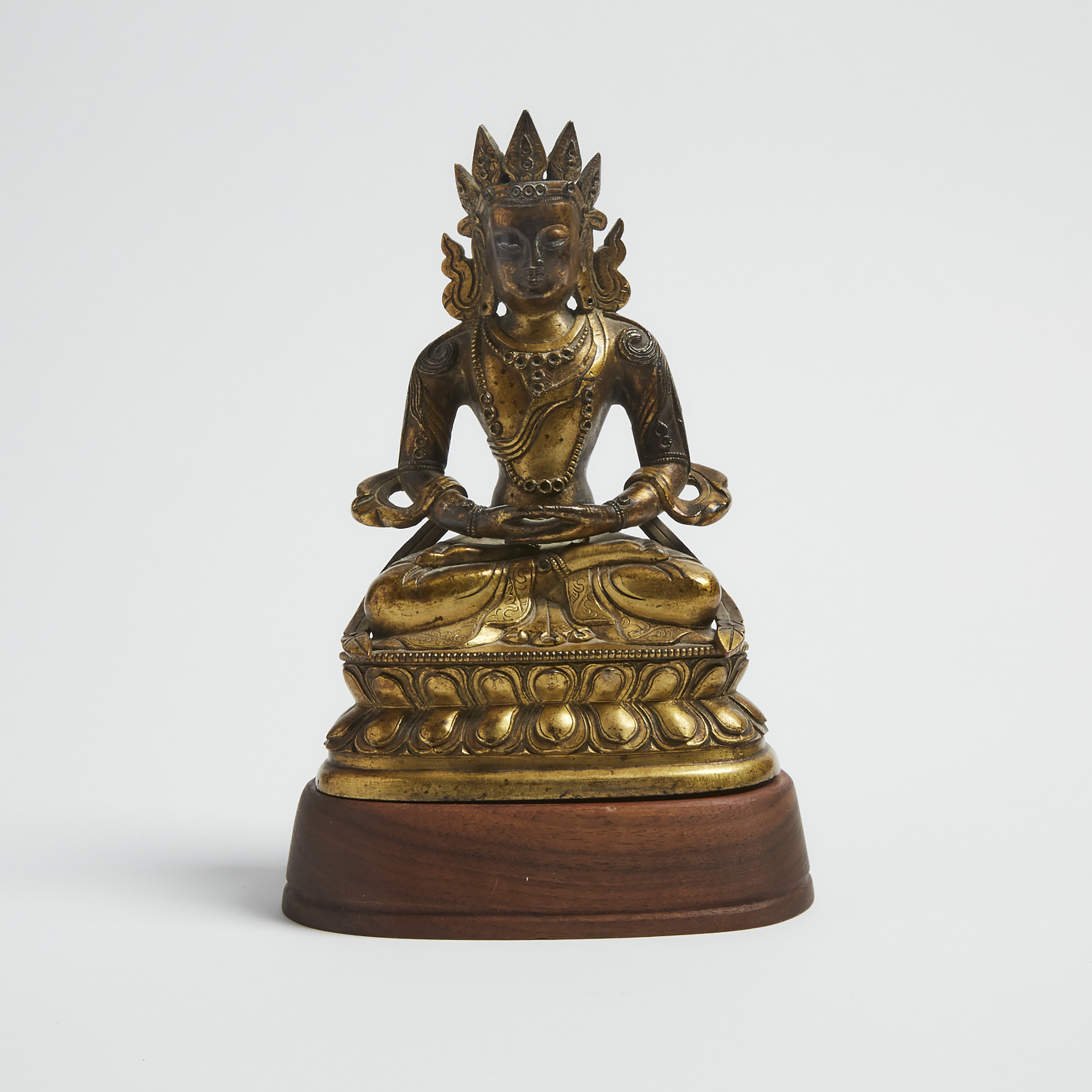 A Sino-Tibetan Gilt Bronze Buddha Figure, Qing Dynasty, 18th Century