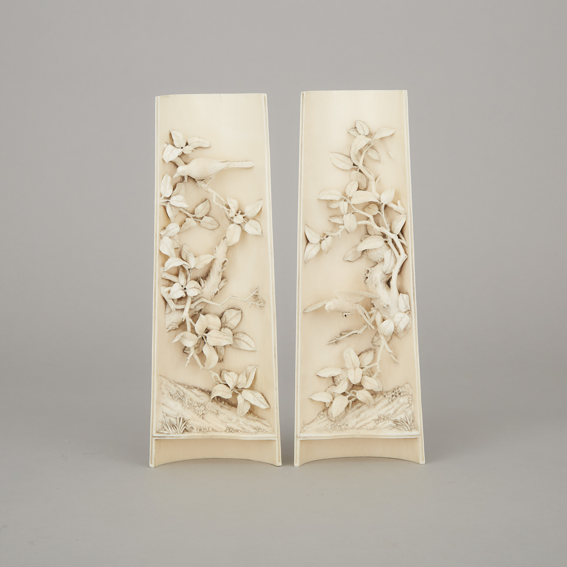 A Pair of Ivory Carved Wrist Rests with Birds, Circa 1900