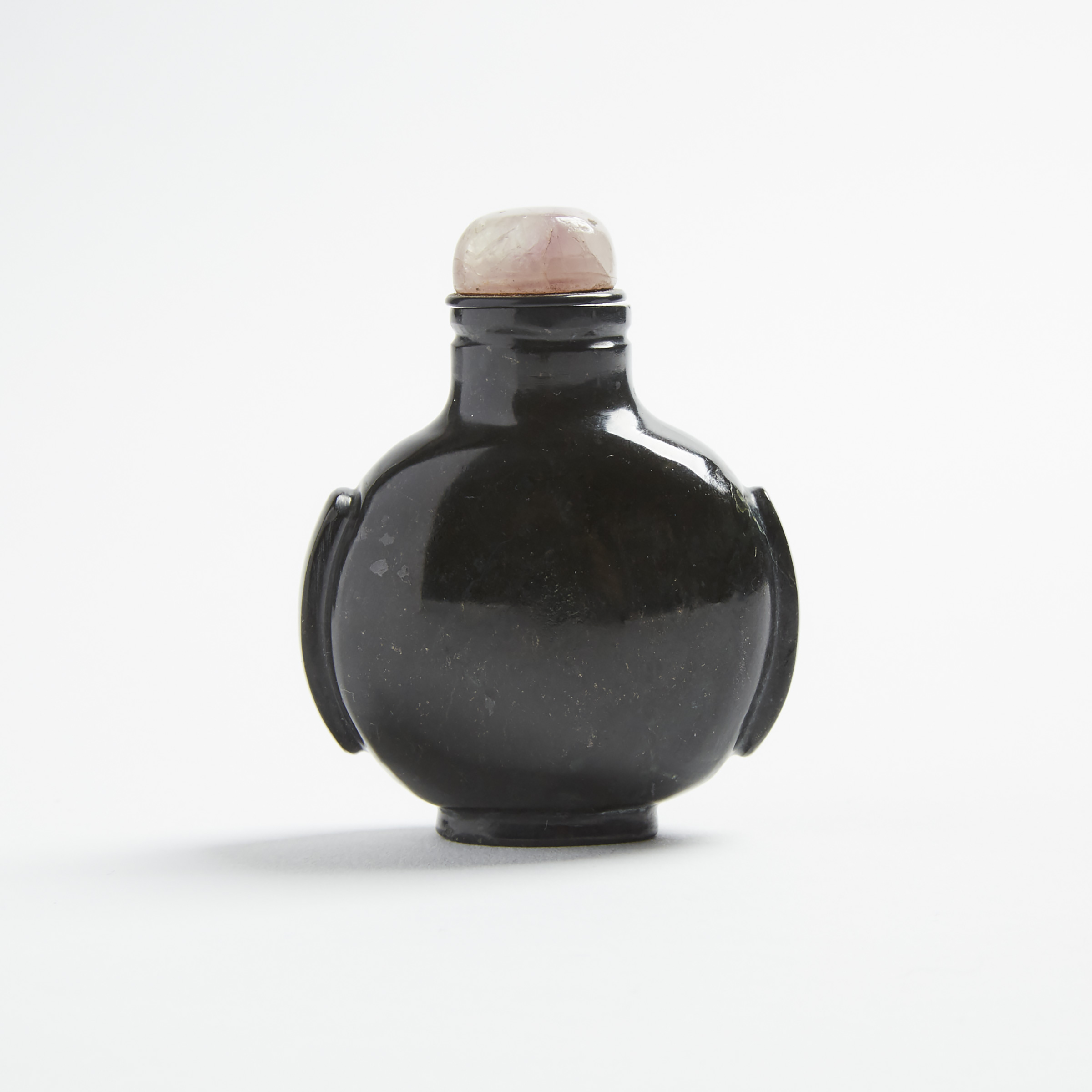 A Black Hardstone Carved Snuff Bottle