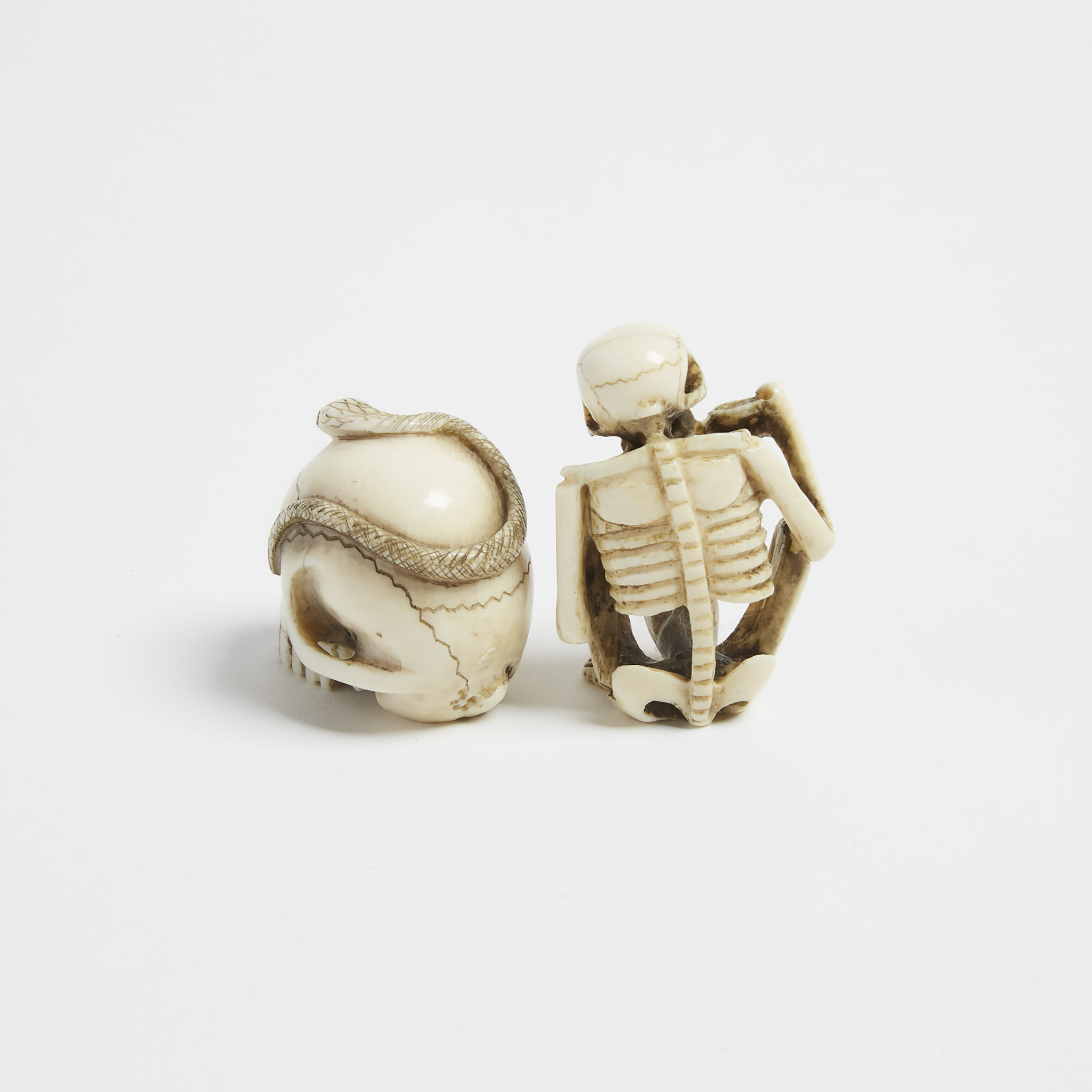 Two Ivory 'Skeleton' Netsuke, One Signed Masayuki, Meiji Period