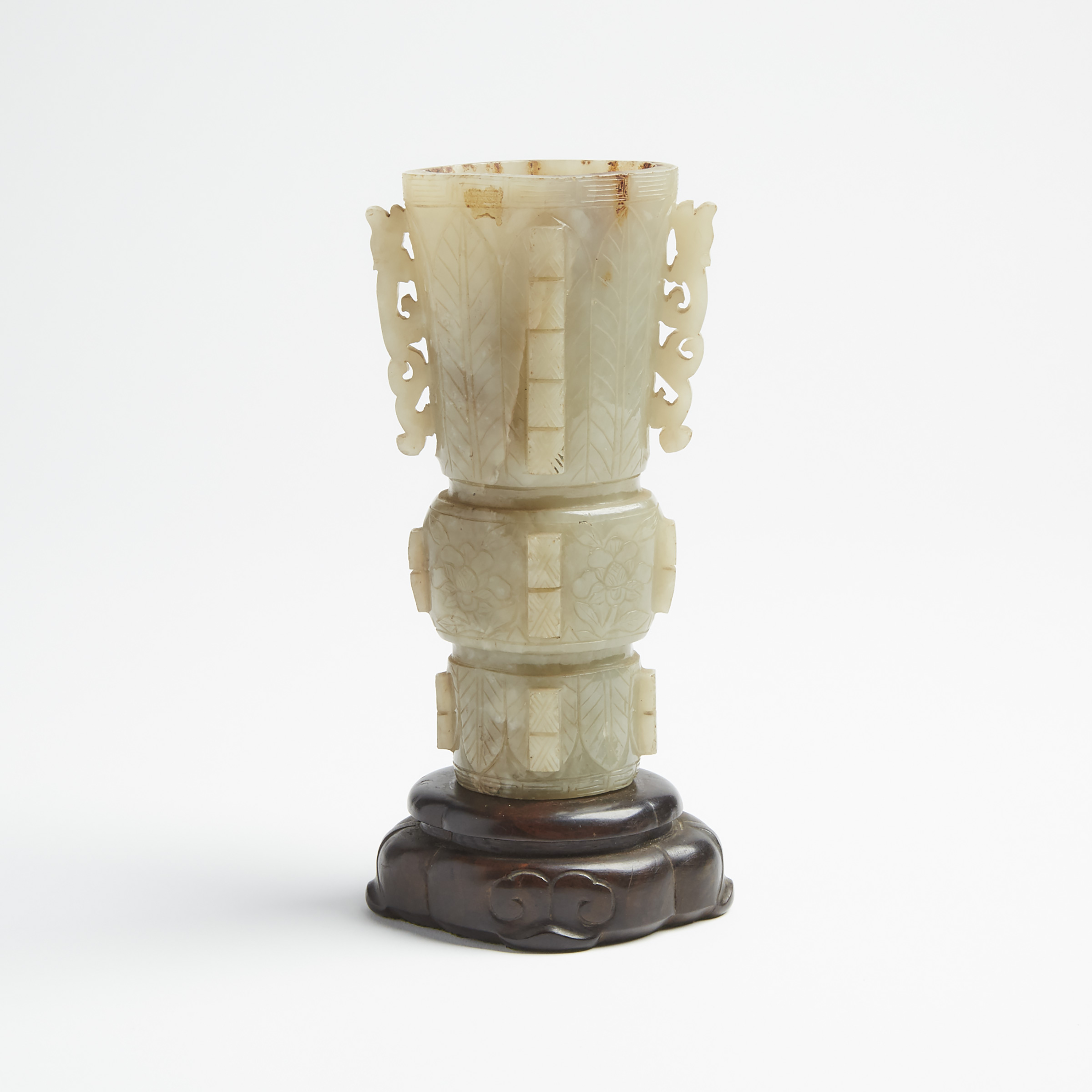 A Celadon Jade Carved 'Gu' Vase