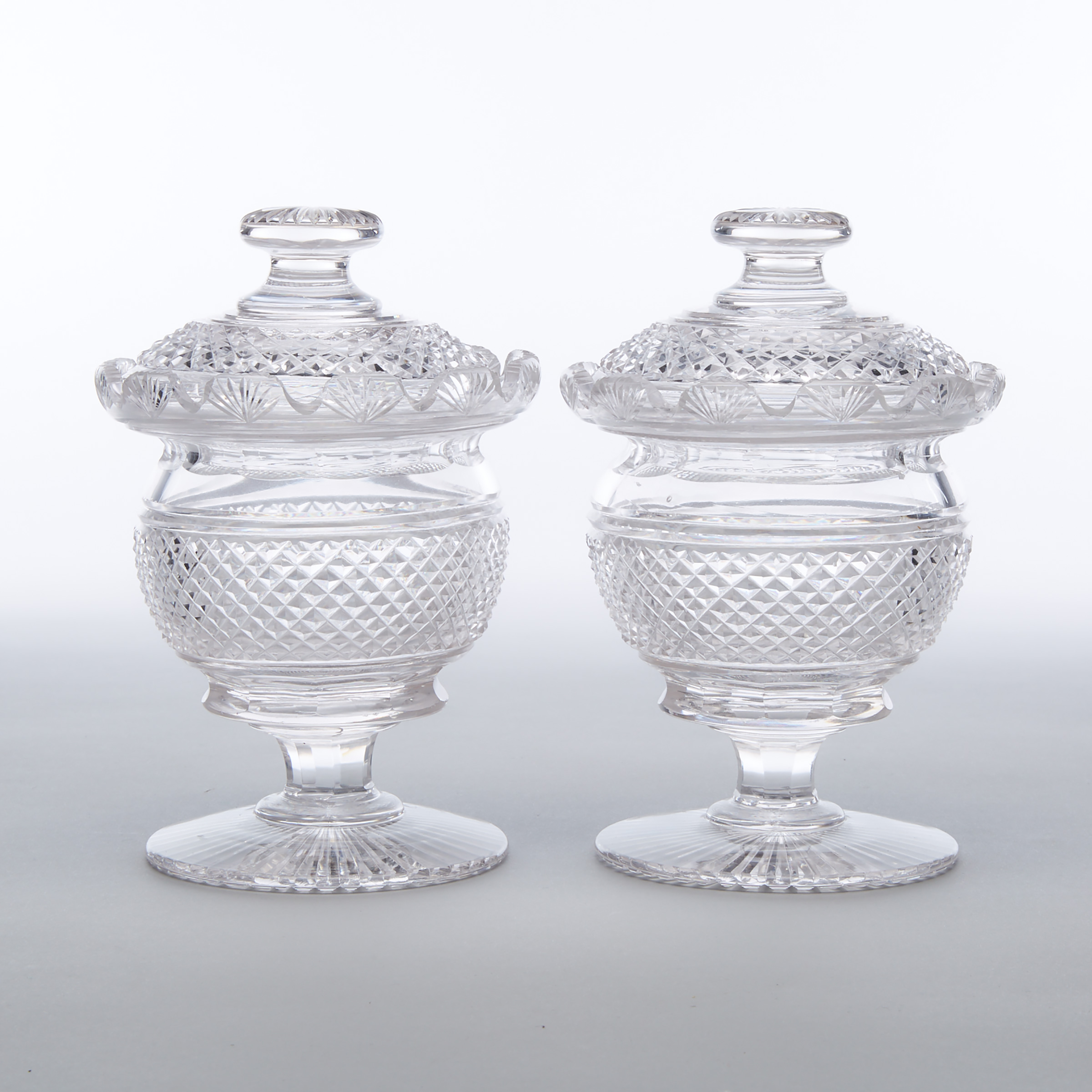 Pair of Anglo-Irish Cut Glass Covered Sweetmeat Vases, 19th century