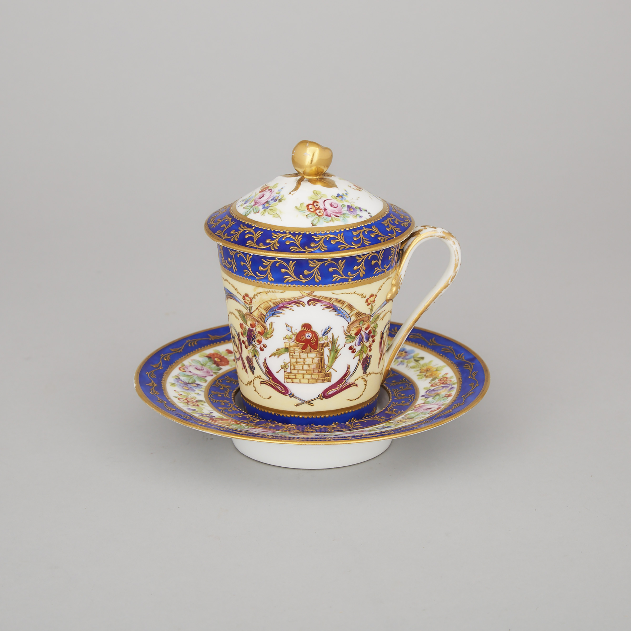 'Sèvres' Floral, Yellow, Blue and Gilt Decorated Chocolate Cup with Cover and Stand, late 19th century