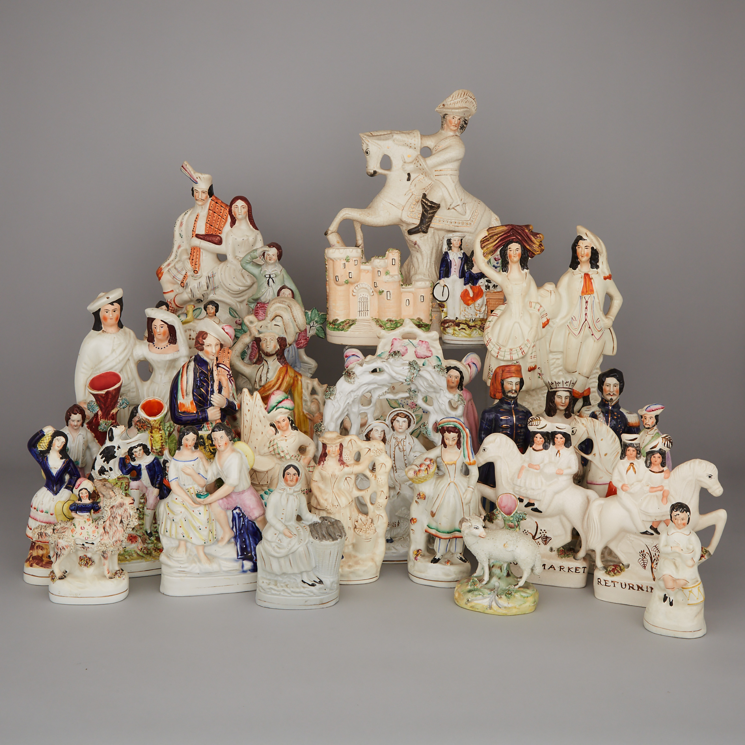 Collection of Twenty-Seven Staffordshire Pottery Figures, Groups and Spill Vases, mainly second half of the 19th century