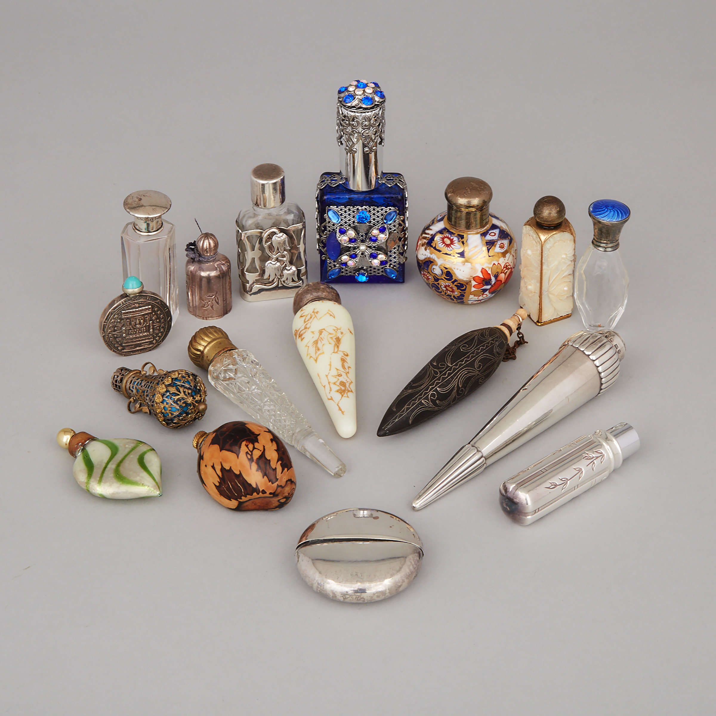 Group of Sixteen Various Silver, Glass and Other Scent Bottles and Phials, late 19th/20th century