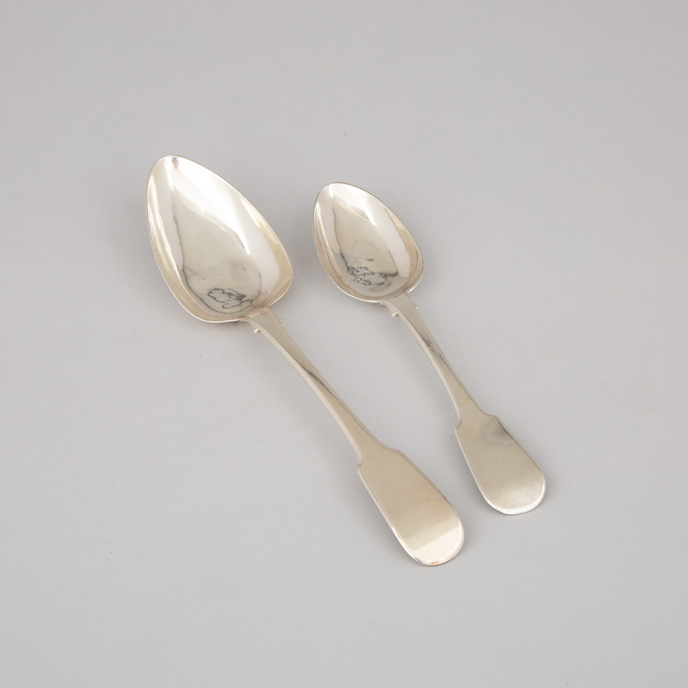 Canadian Silver Fiddle Pattern Table Spoon and a Dessert Spoon, Laurent Amiot, Quebec City, Que., c.1830 