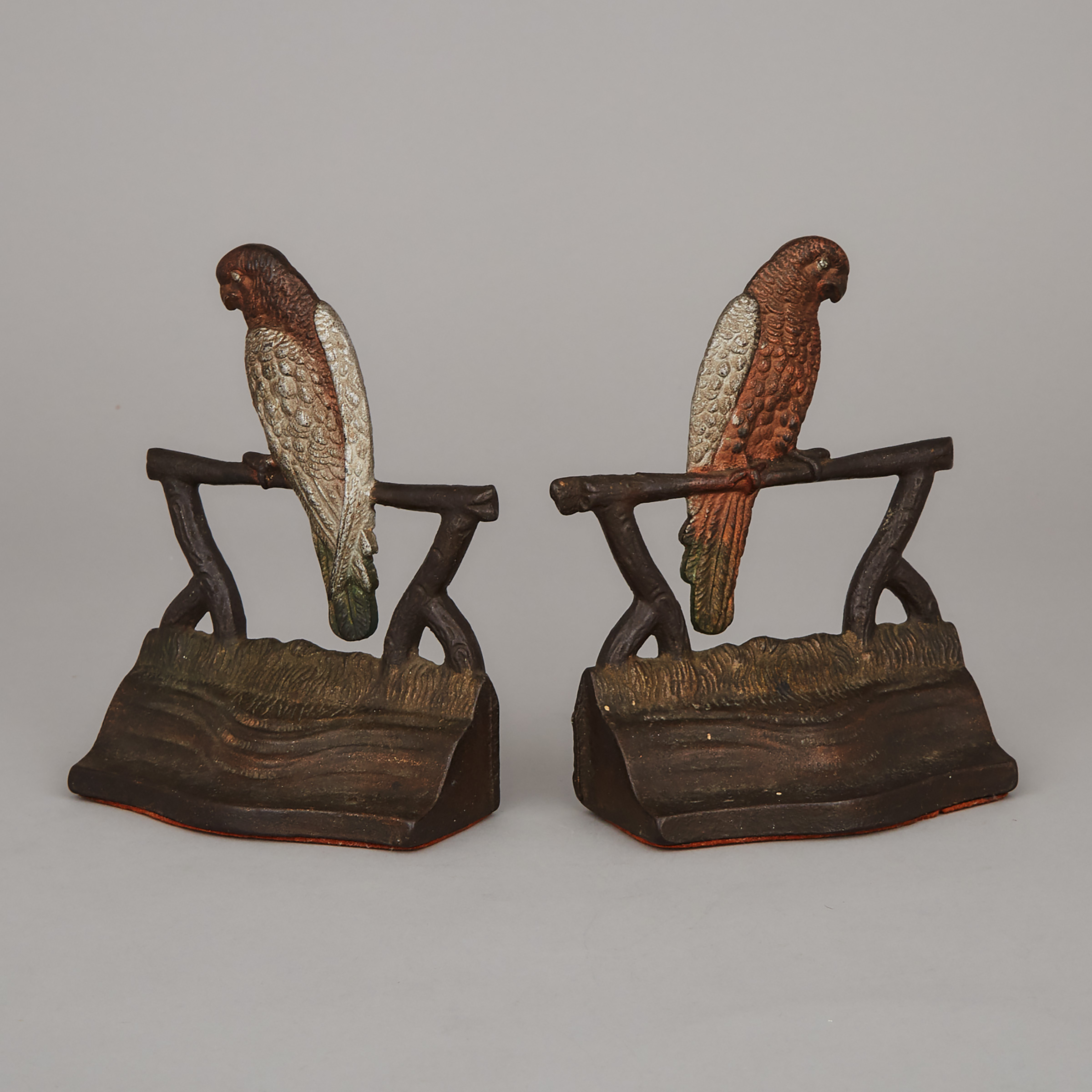Pair of American Cold Painted Cast Iron Parrot Form Bookends, early 20th century