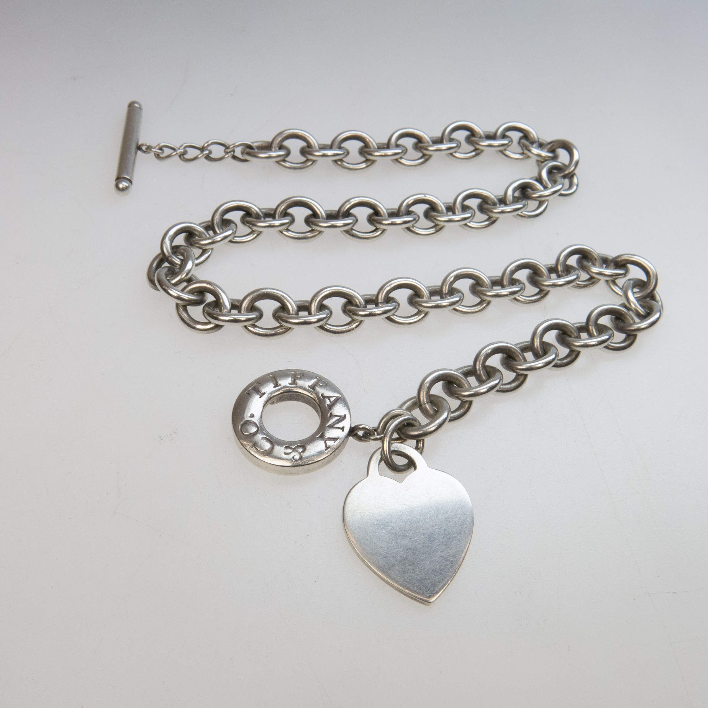 Tiffany & Co. Sterling Silver Circular Link Chain With Heart-Shaped Tag