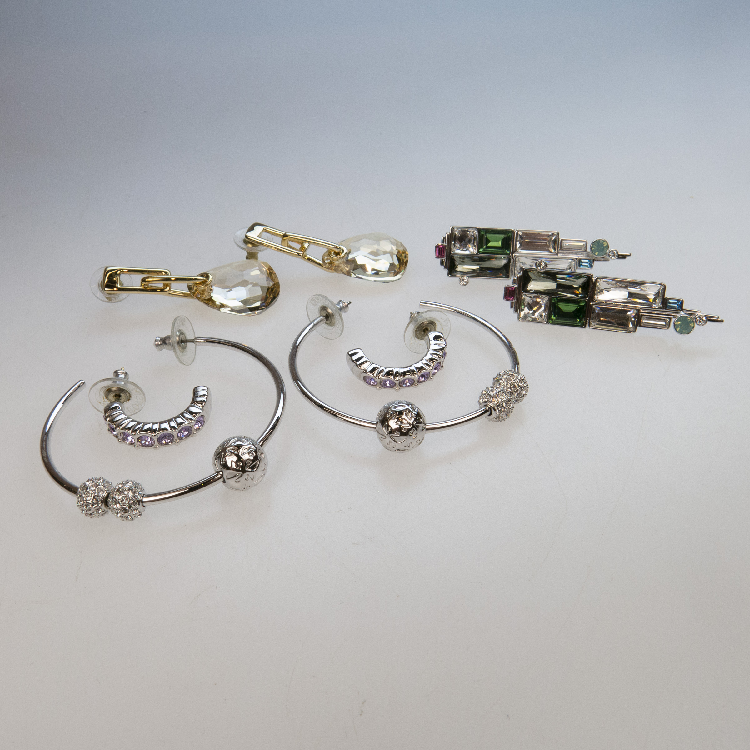 Two Swarovski Resin Bangles And Four Pairs Of Swarovski Metal And Rhinestone Earrings