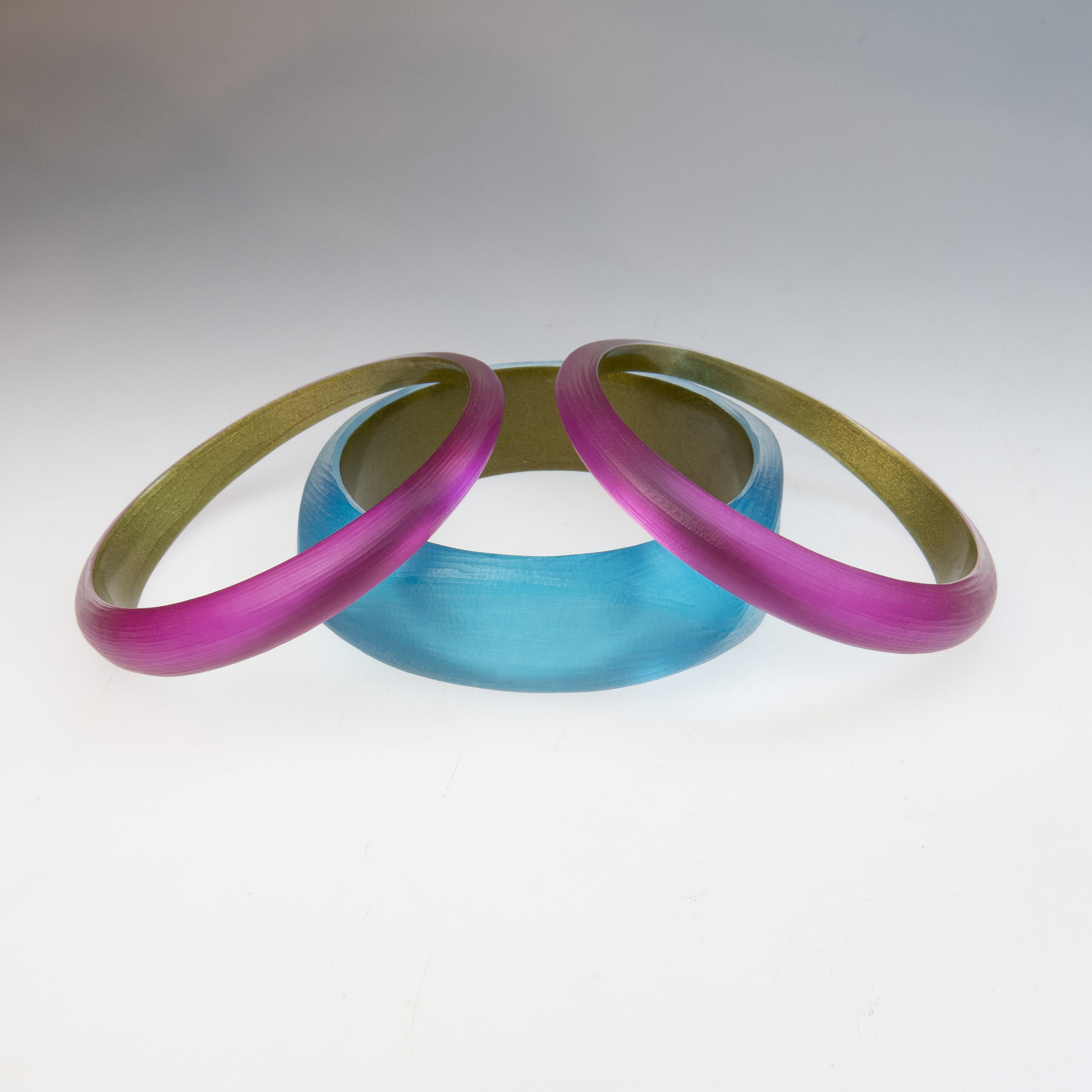 Three Alexis Bittar Carved Lucite Bangle