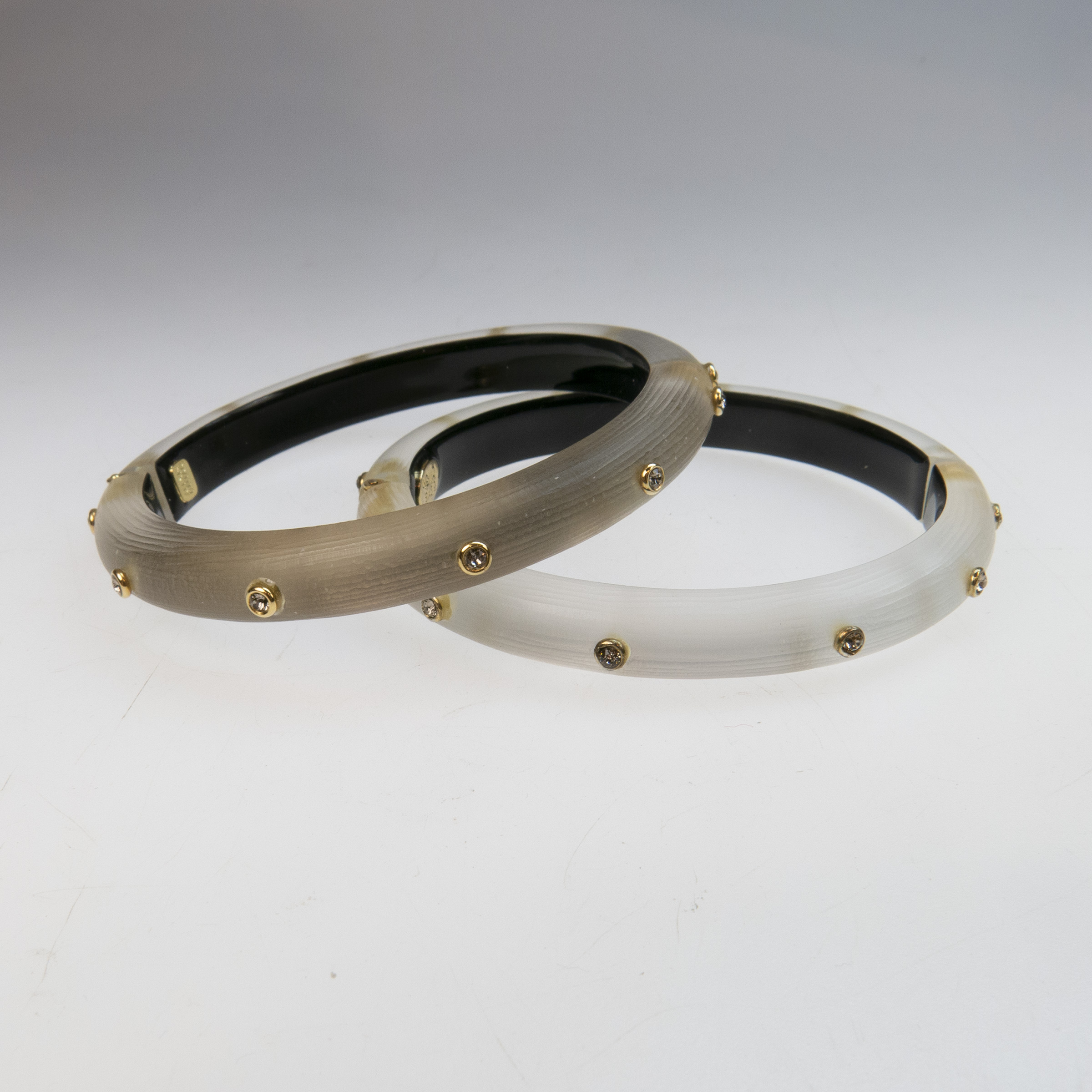 Two Alexis Bittar Carved Lucite Spring Hinged Bangles