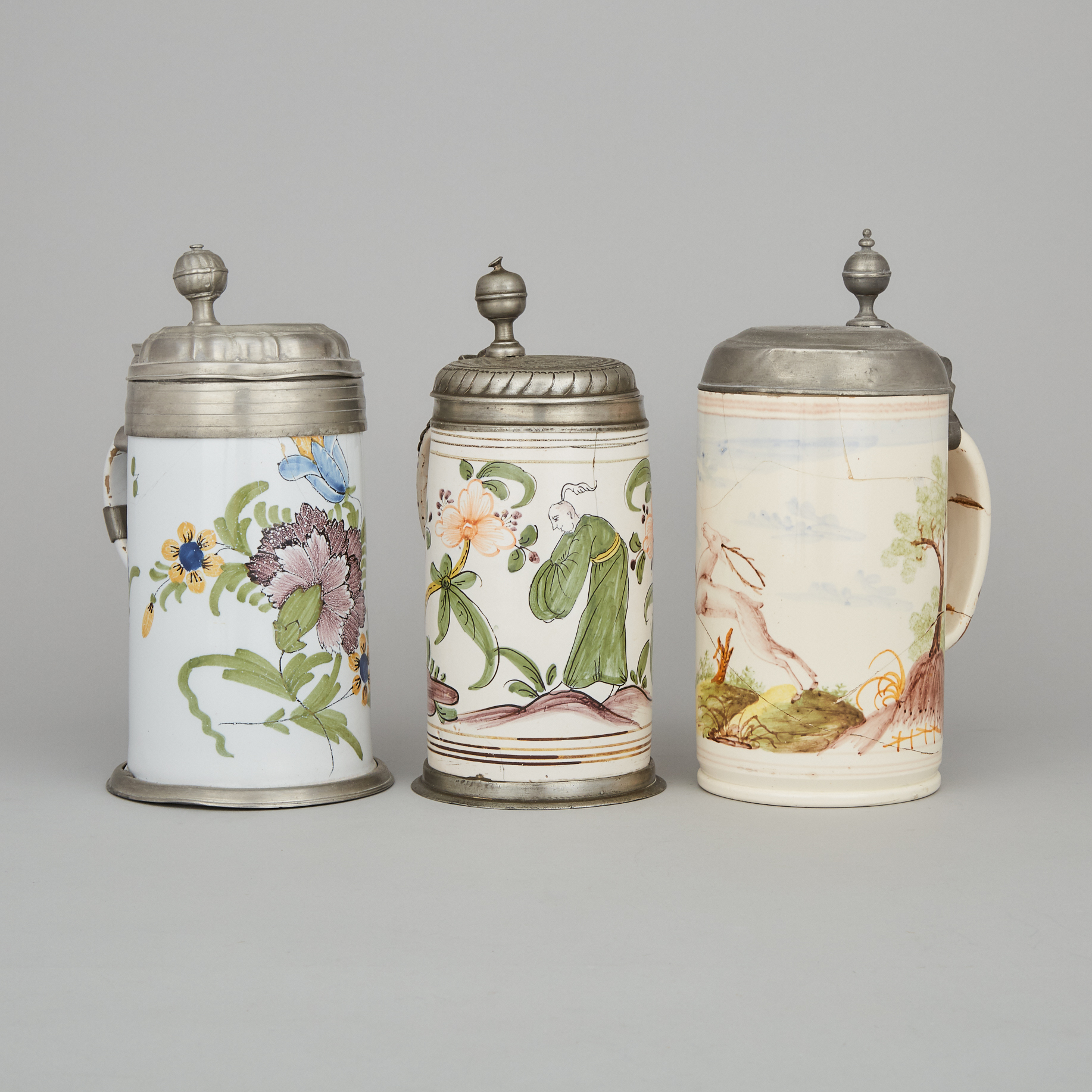 Three German Pewter Mounted Faience Steins, late 18th/early 19th century