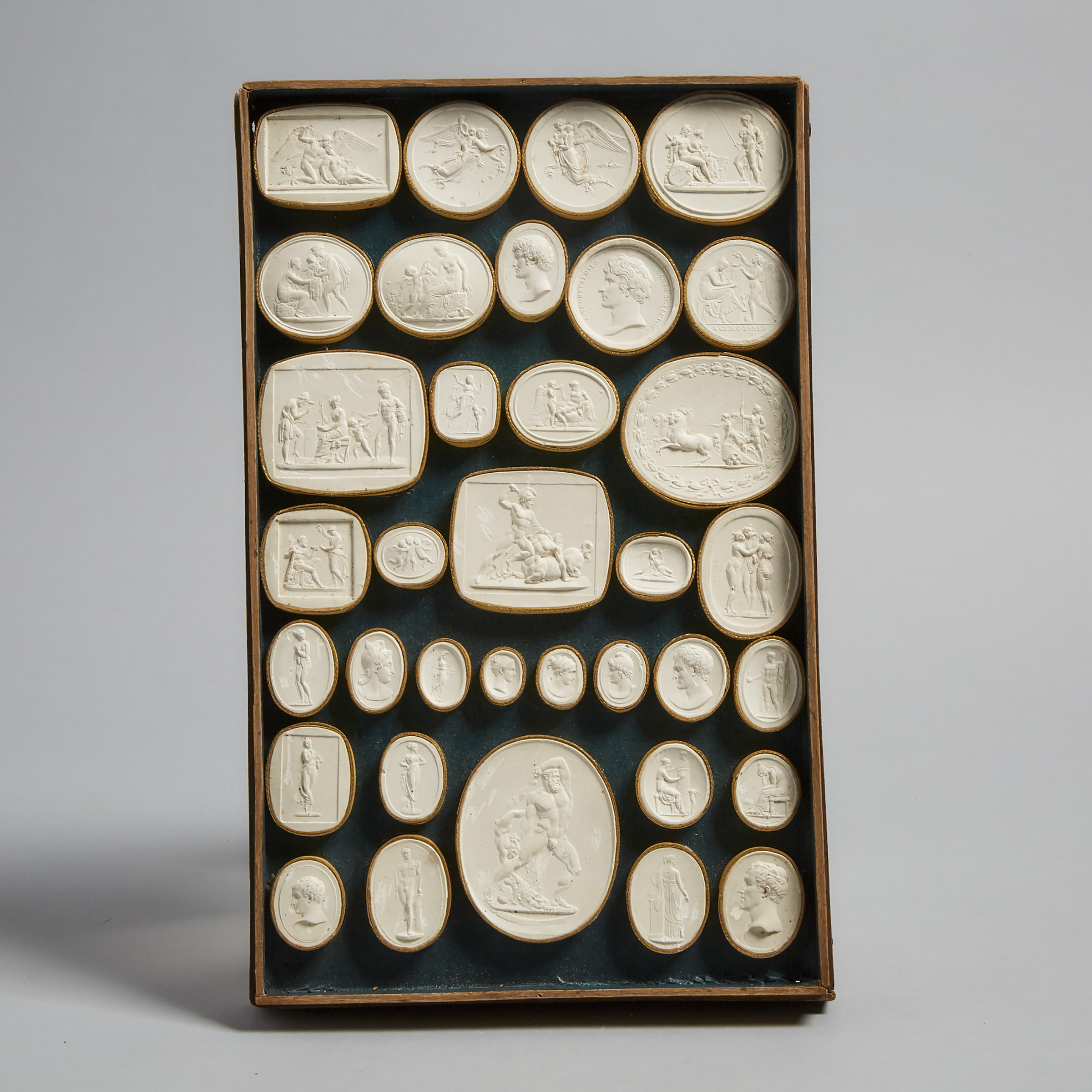 Cased Set of Italian Plaster Intaglio Medallions by Pietro Bracci, Rome, late 18th/early 19th century
