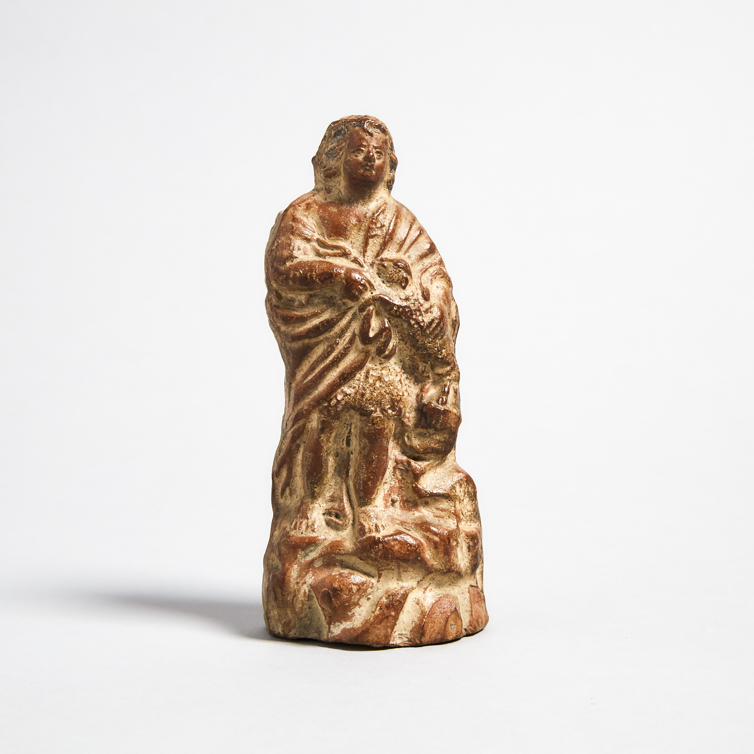 Continental Terra Cotta Nativity Figure of a Shepherd with Lamb, 18th century or earlier