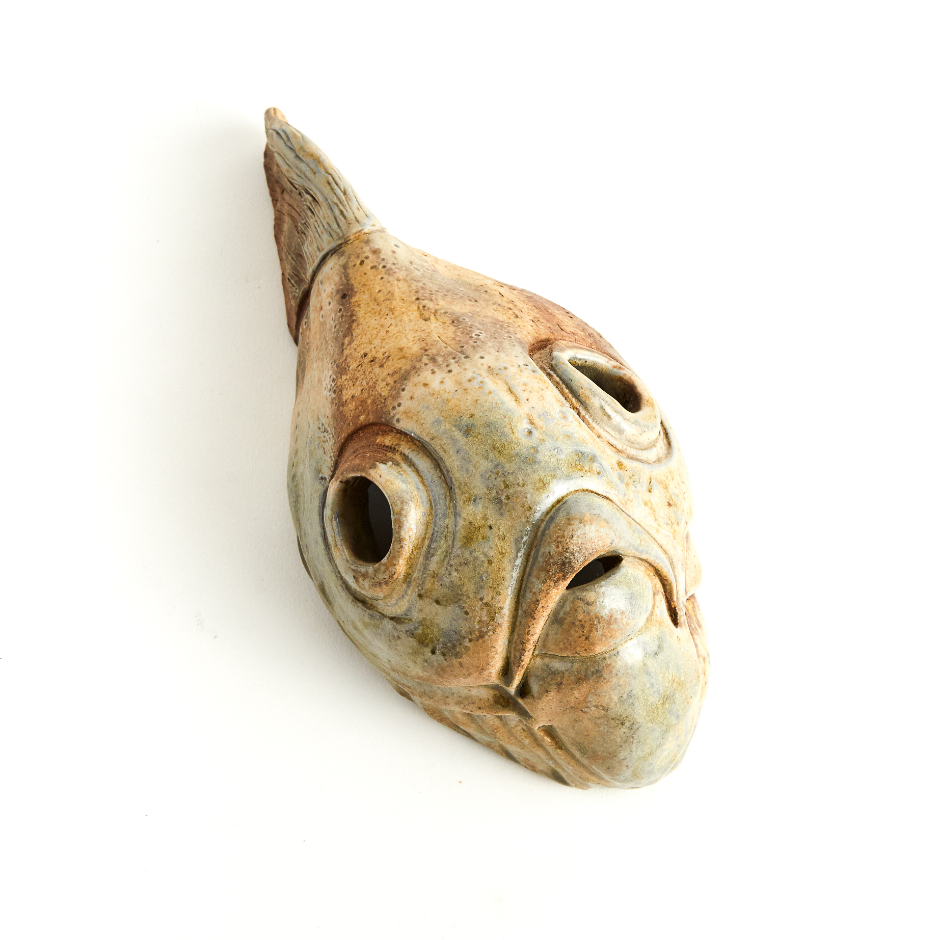 Marvin Bjurlin (American, b.1944), Seven Stoneware Fish Heads, c.2010