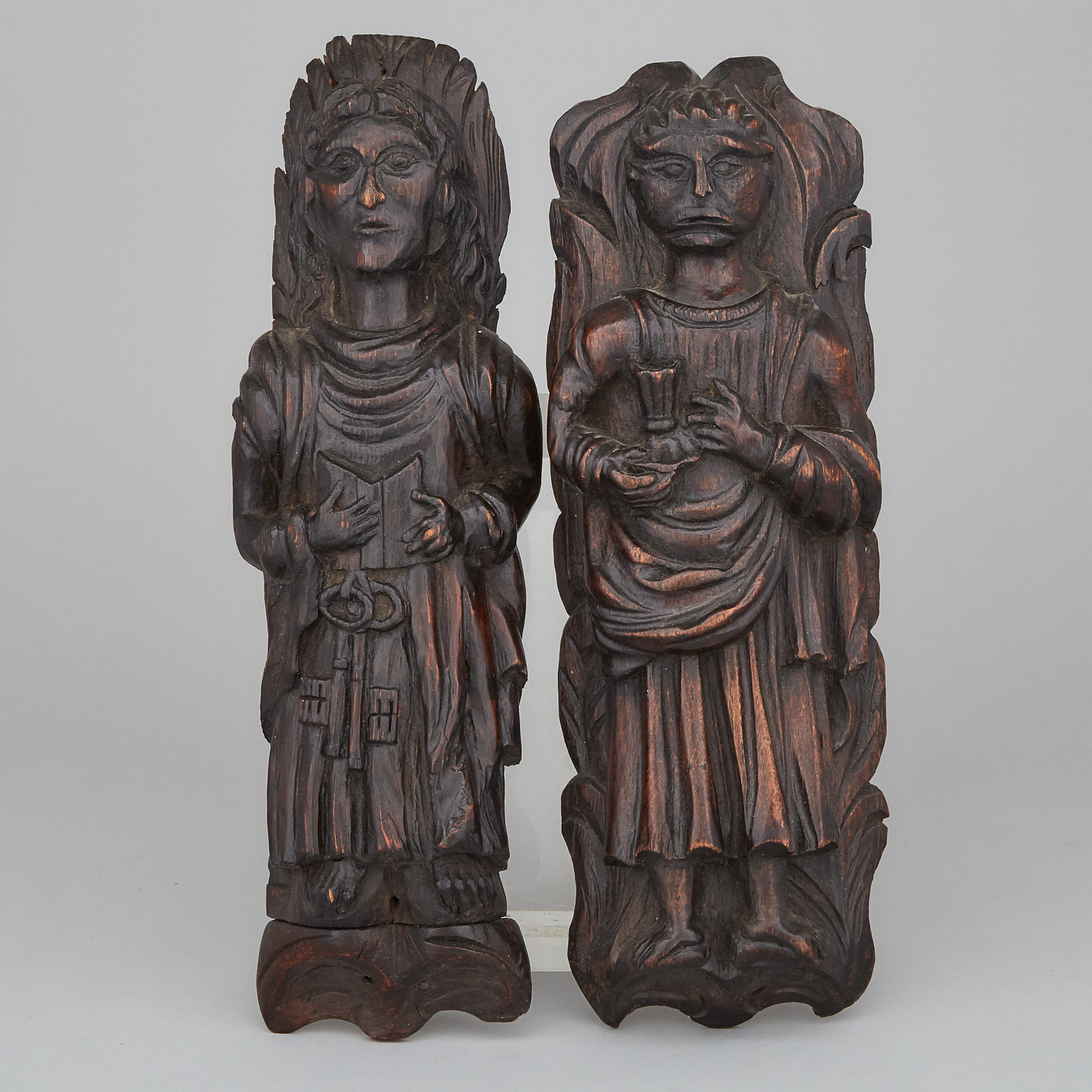 Pair of English Carved Wood Apostolic Term Figures, 16th century