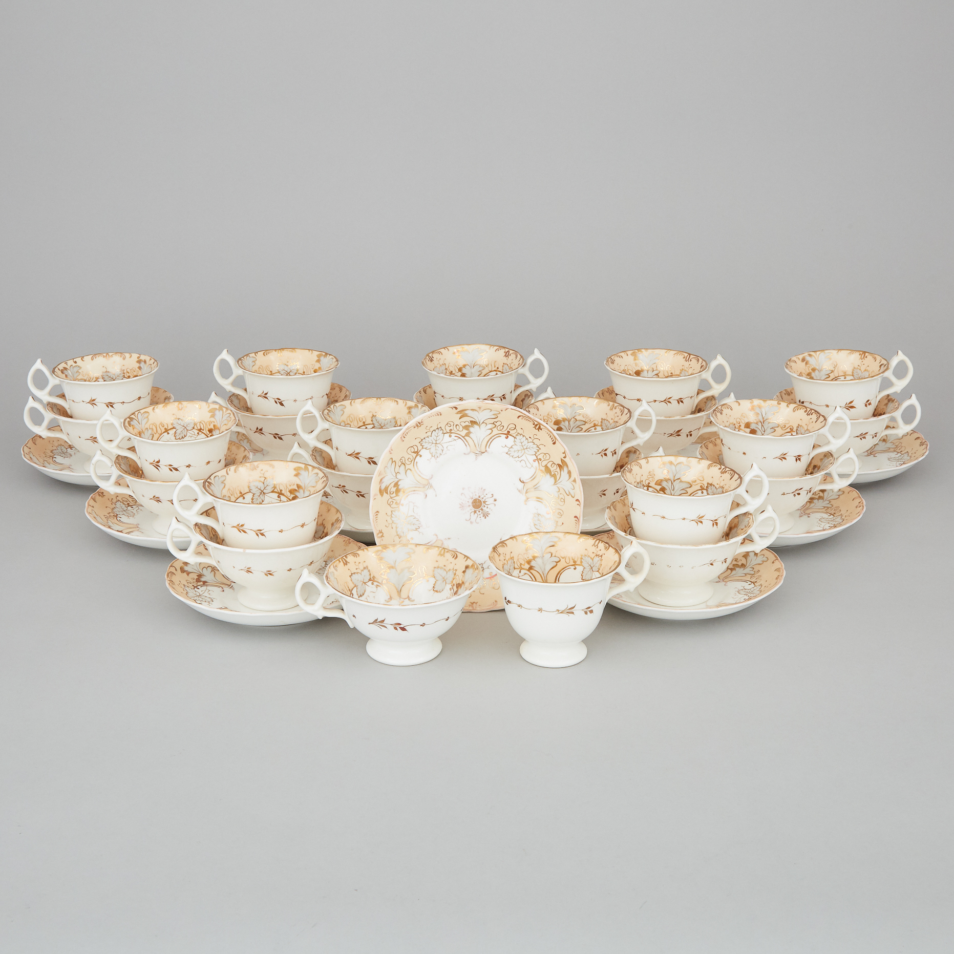 Twelve English Porcelain Apricot and Gilt Decorated Tea Cups, Coffee Cups and Saucers, mid-19th century