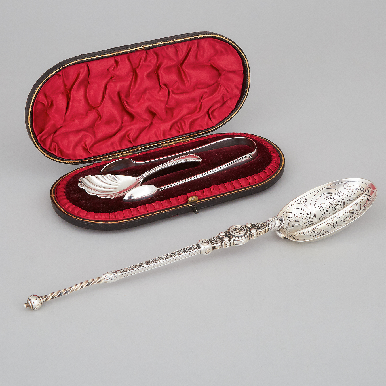 Victorian Silver Anointing Spoon, Caddy Spoon and Sugar Tongs, London, 1876 and 1893