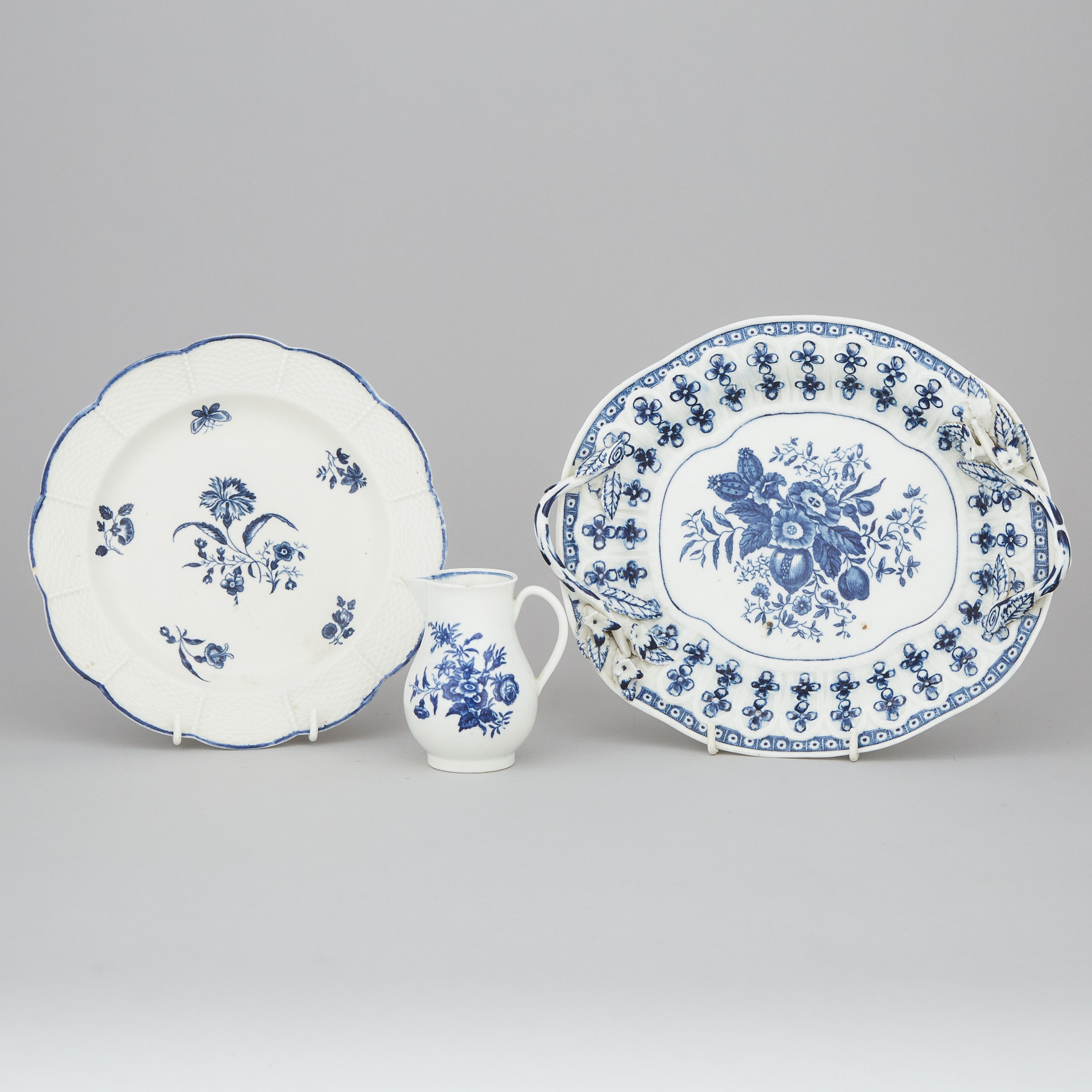 Two Worcester Blue and White Printed Porcelain Dishes and a Cream Jug, late 18th century