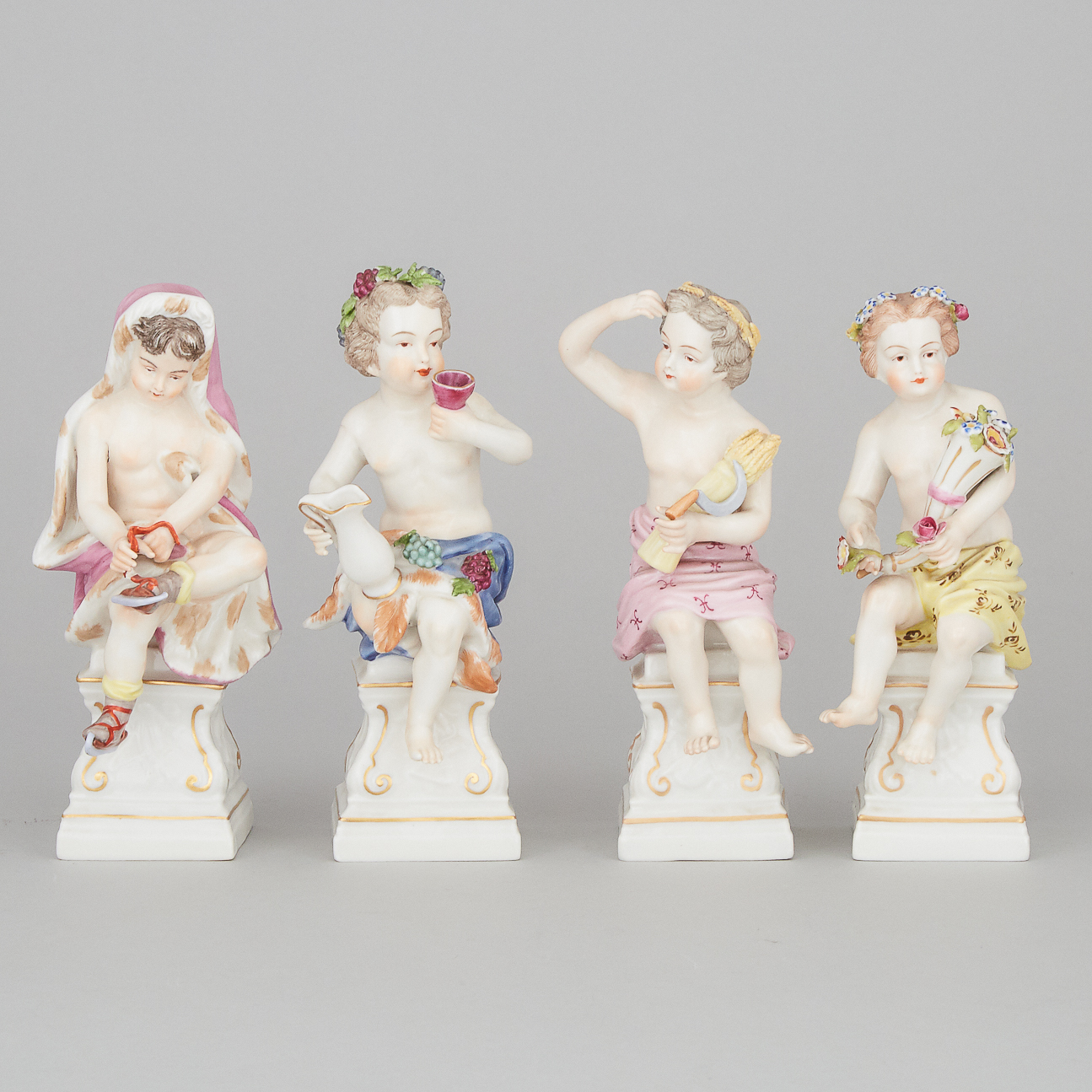 Set of Four 'Vienna' Figures of Putti Emblematic of the Seasons, 20th century