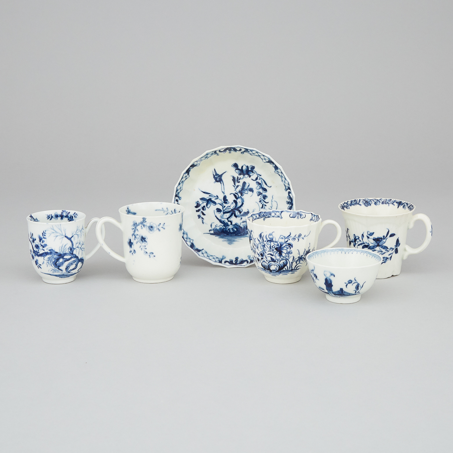 Four Worcester Blue Painted Cups with One Saucer, and a Tea Bowl, c.1760