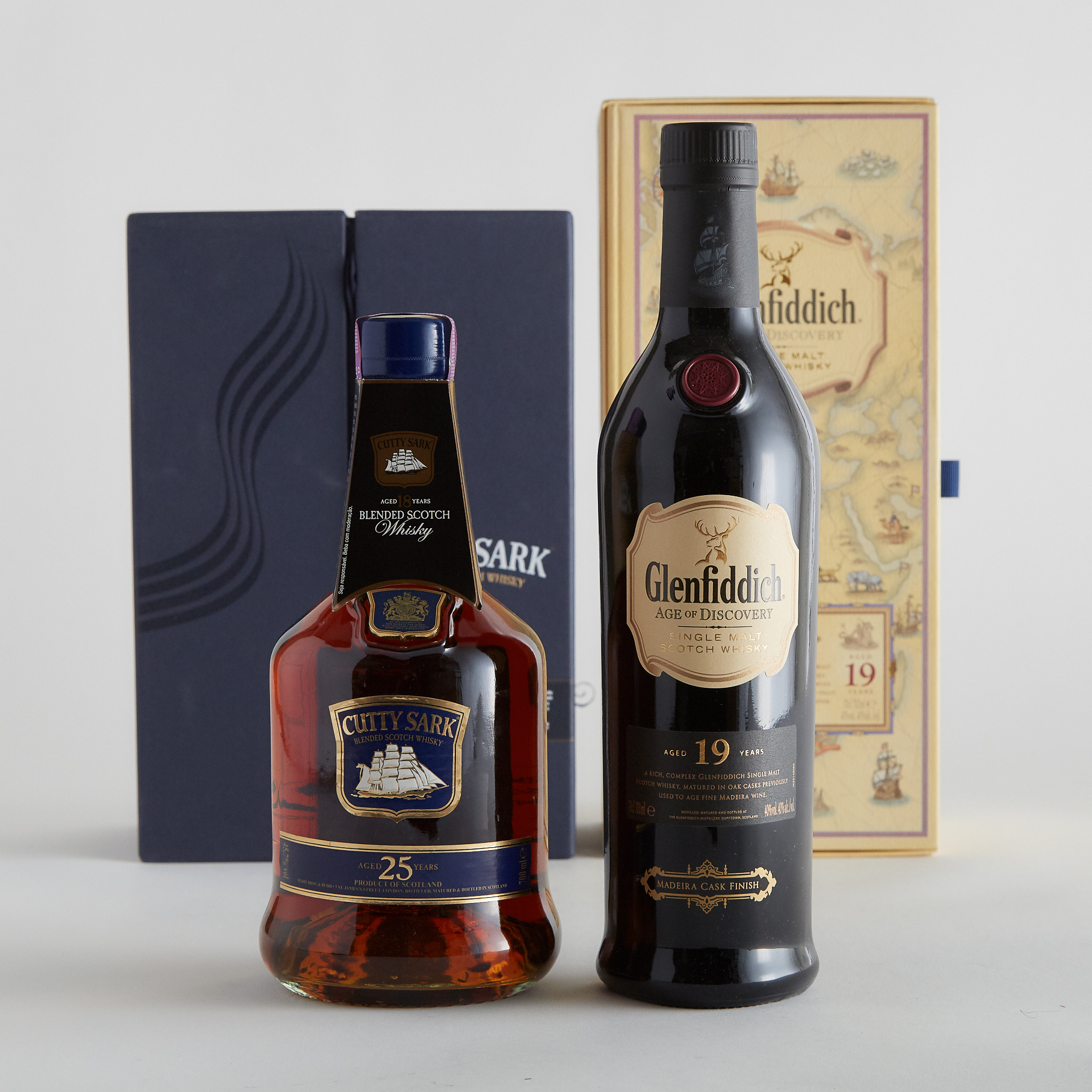 CUTTY SARK BLENDED SCOTCH WHISKY 25 YEARS (ONE 700 ML)
GLENFIDDICH SINGLE MALT SCOTCH WHISKY 19 YEARS (ONE 700 ML)