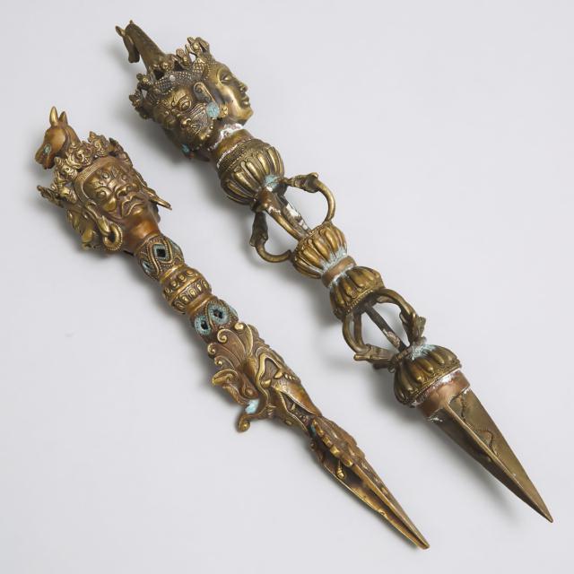 Two Indo-Tibetan Bronze Ceremonial Phurba Daggers, early 20th century