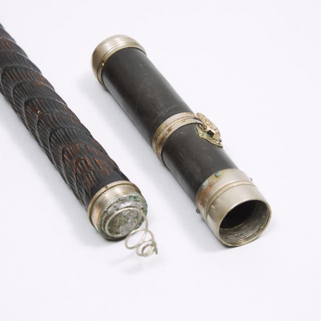 French Carved Ebony System or Gadget Cane, early 20th century