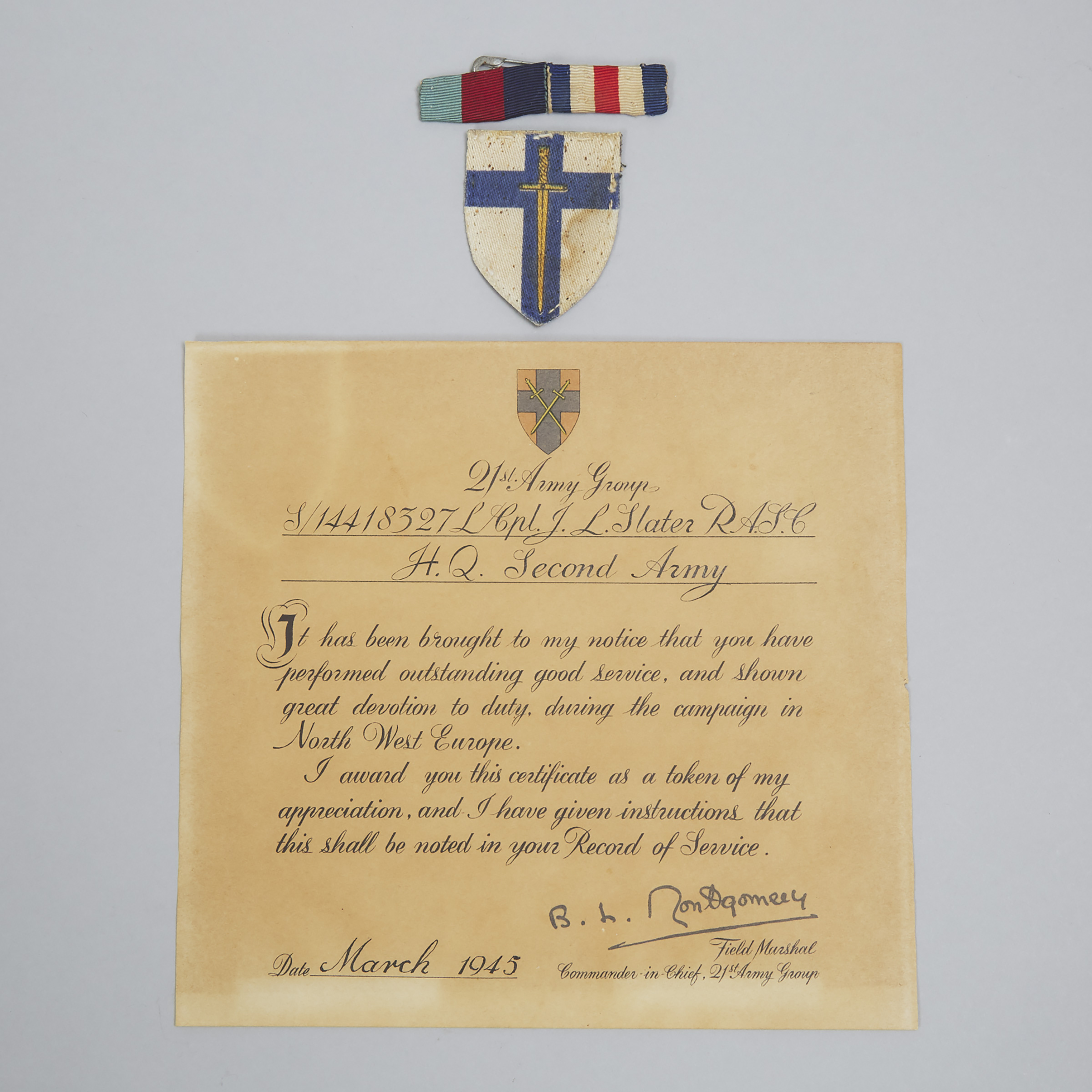 Field Marshall B. L. Montgomery, Commander-in-Chief, Certificate of Merit to L. Cpl. J. L. Slater, Royal Army Service Corps, March, 1945