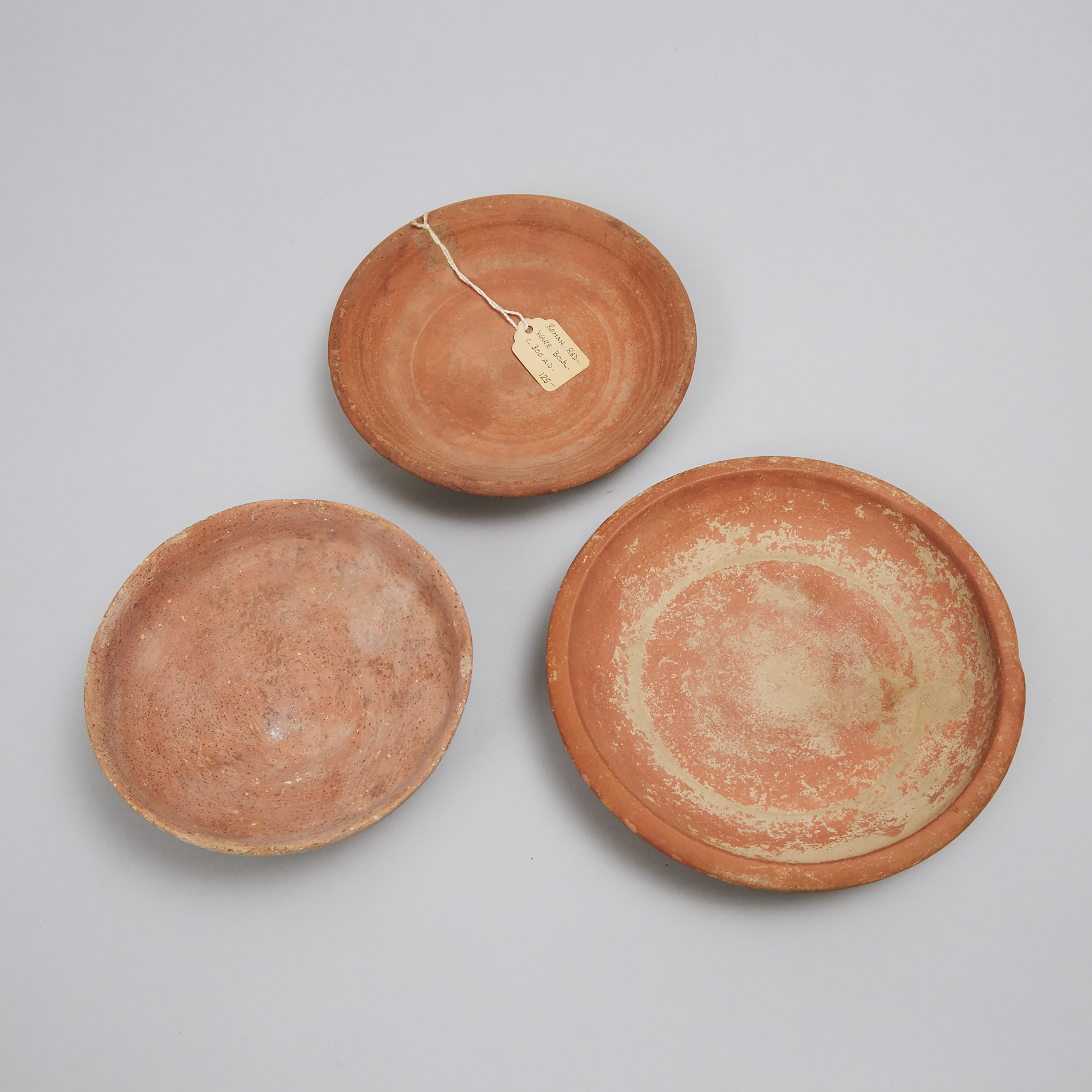 Three Roman Period North African Redware Pottery Dishes, 300 A.D.