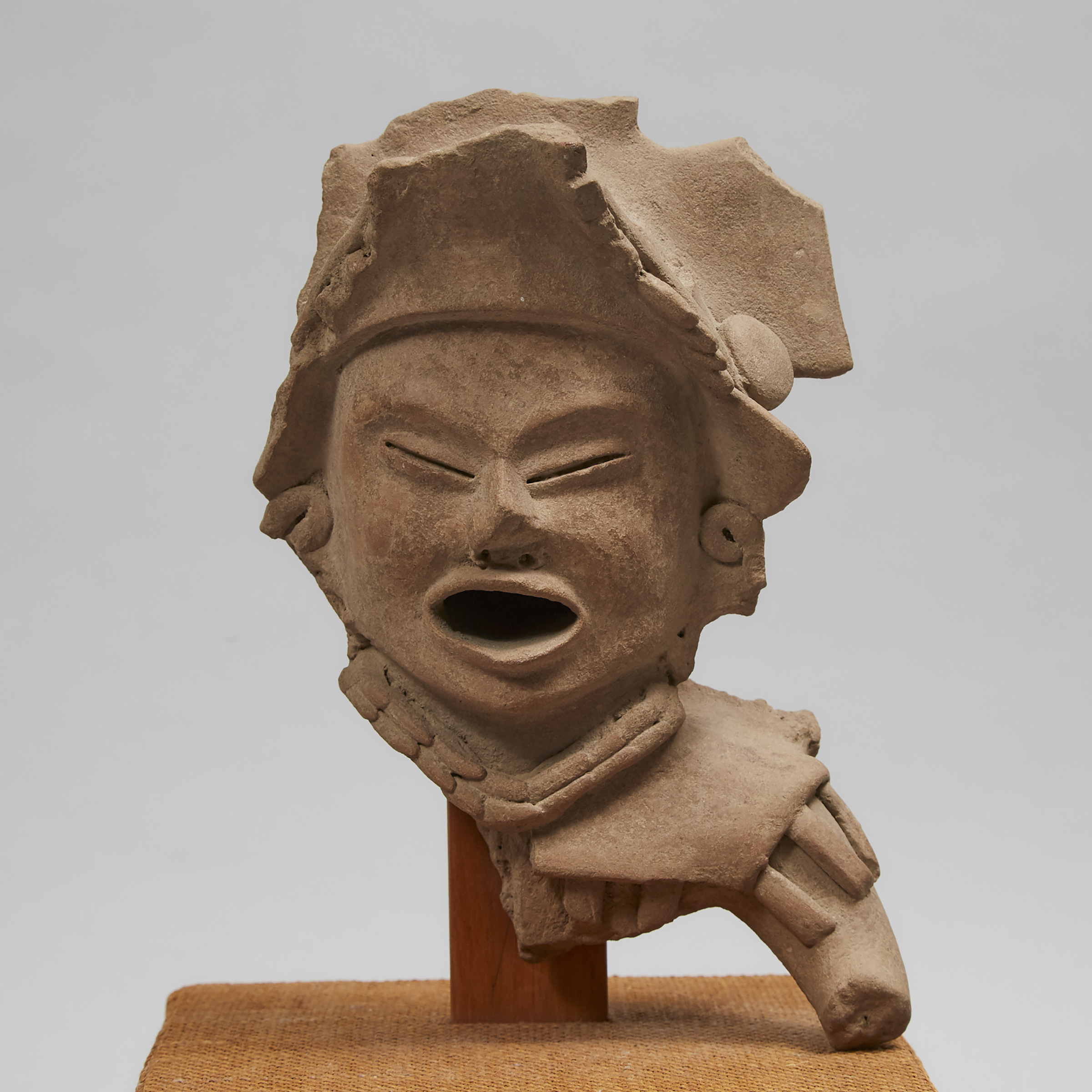 Veracruz Pottery Head and Shoulder Fragment of a Figure of Xipe Totec, South East Mexico, 500 - 900 A.D.