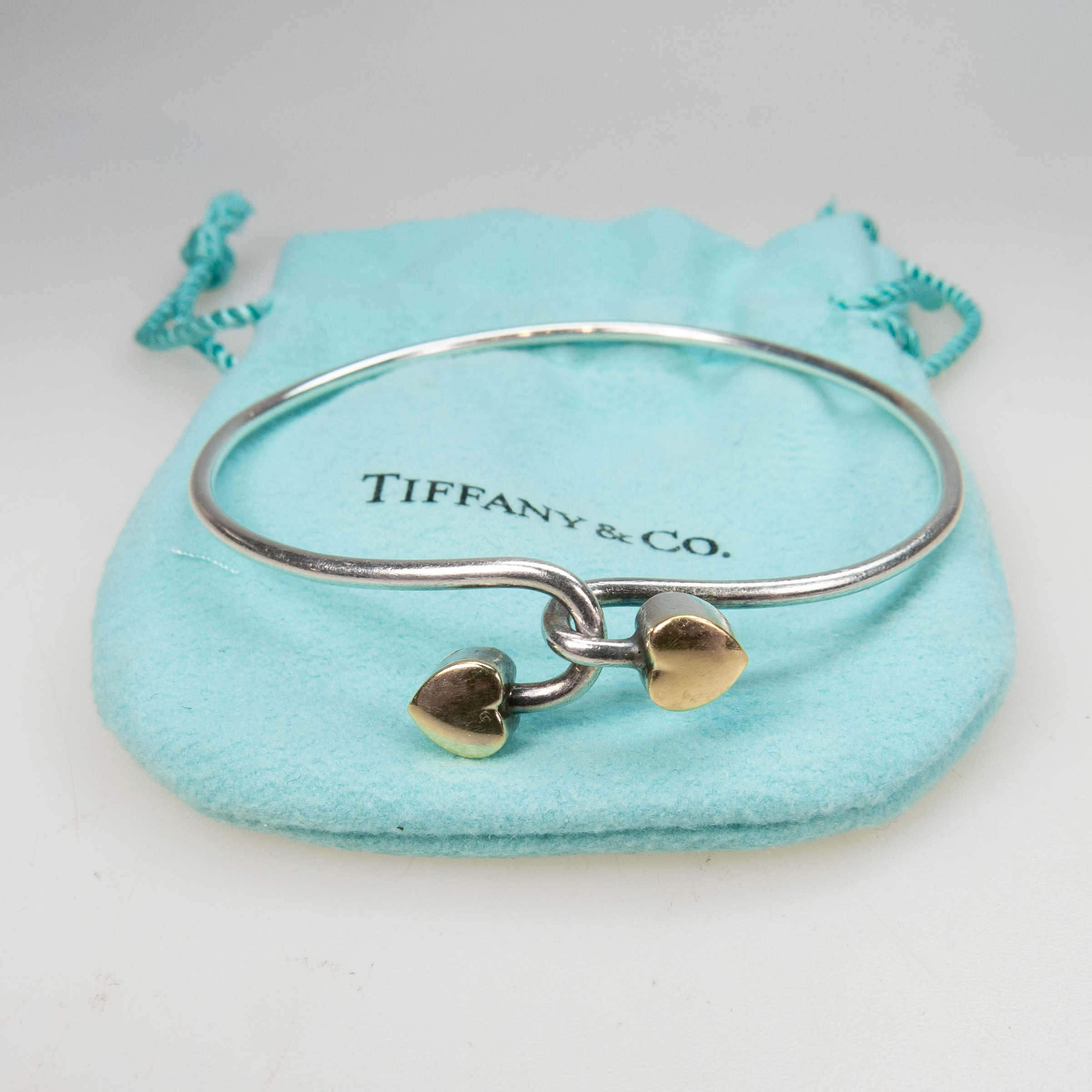 Tiffany & Co. Sterling Silver & 18k Yellow Gold Interlocked Heart Bangle