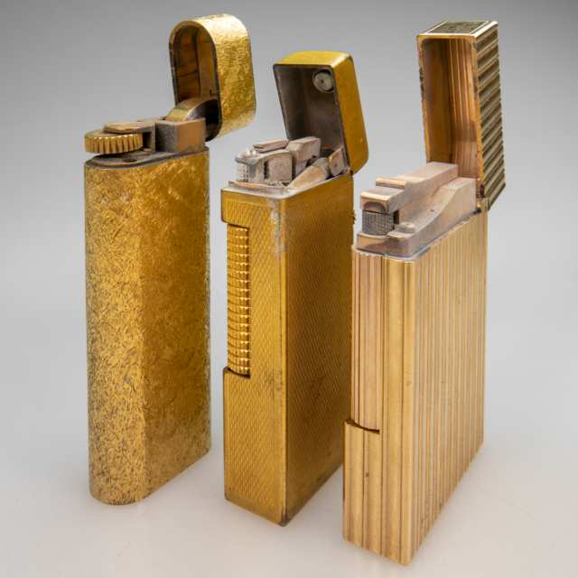 Three Lighters By Cartier, Dunhill, And Dupont