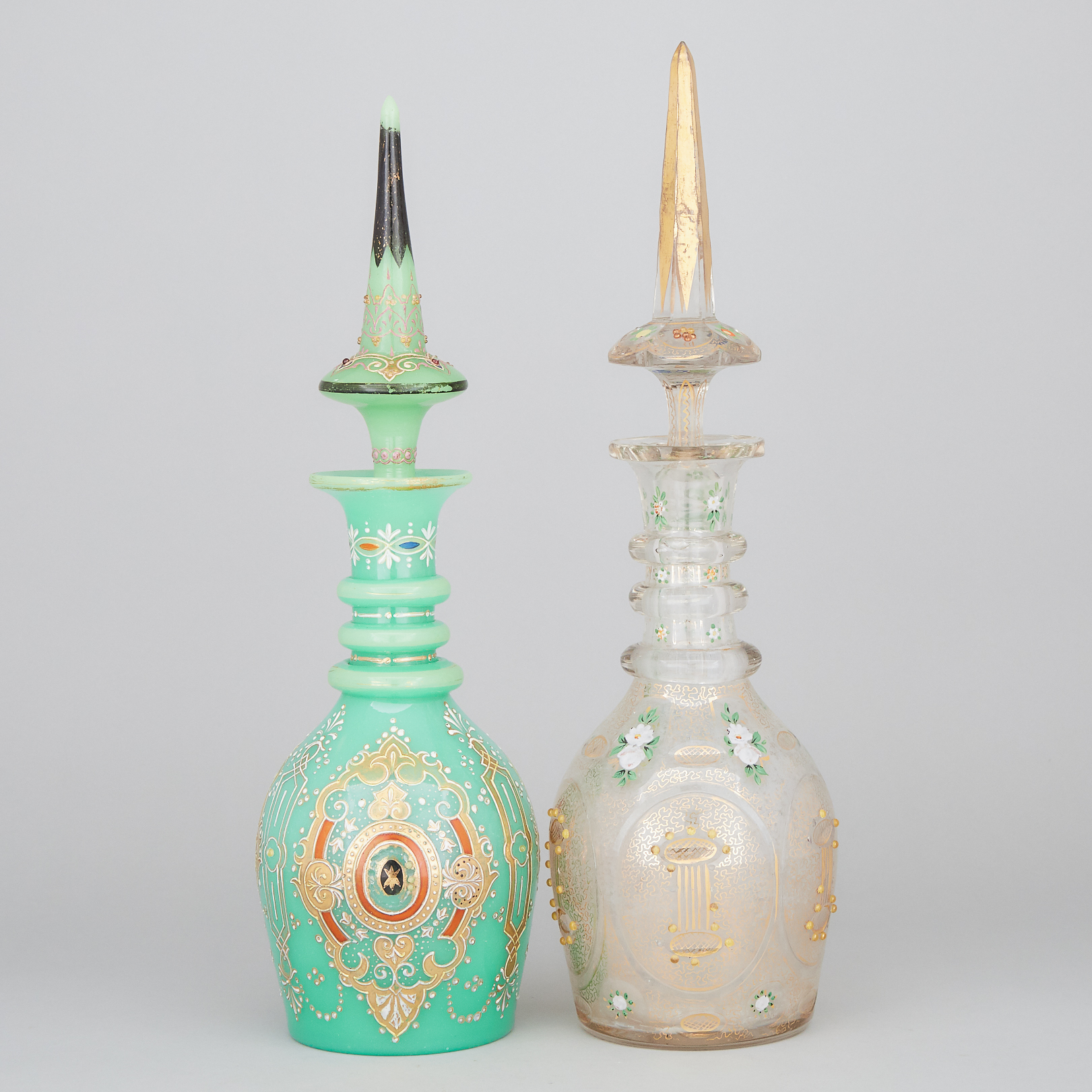 Two Large Bohemian Enameled Glass Decanters, for the Turkish market, late 19th century