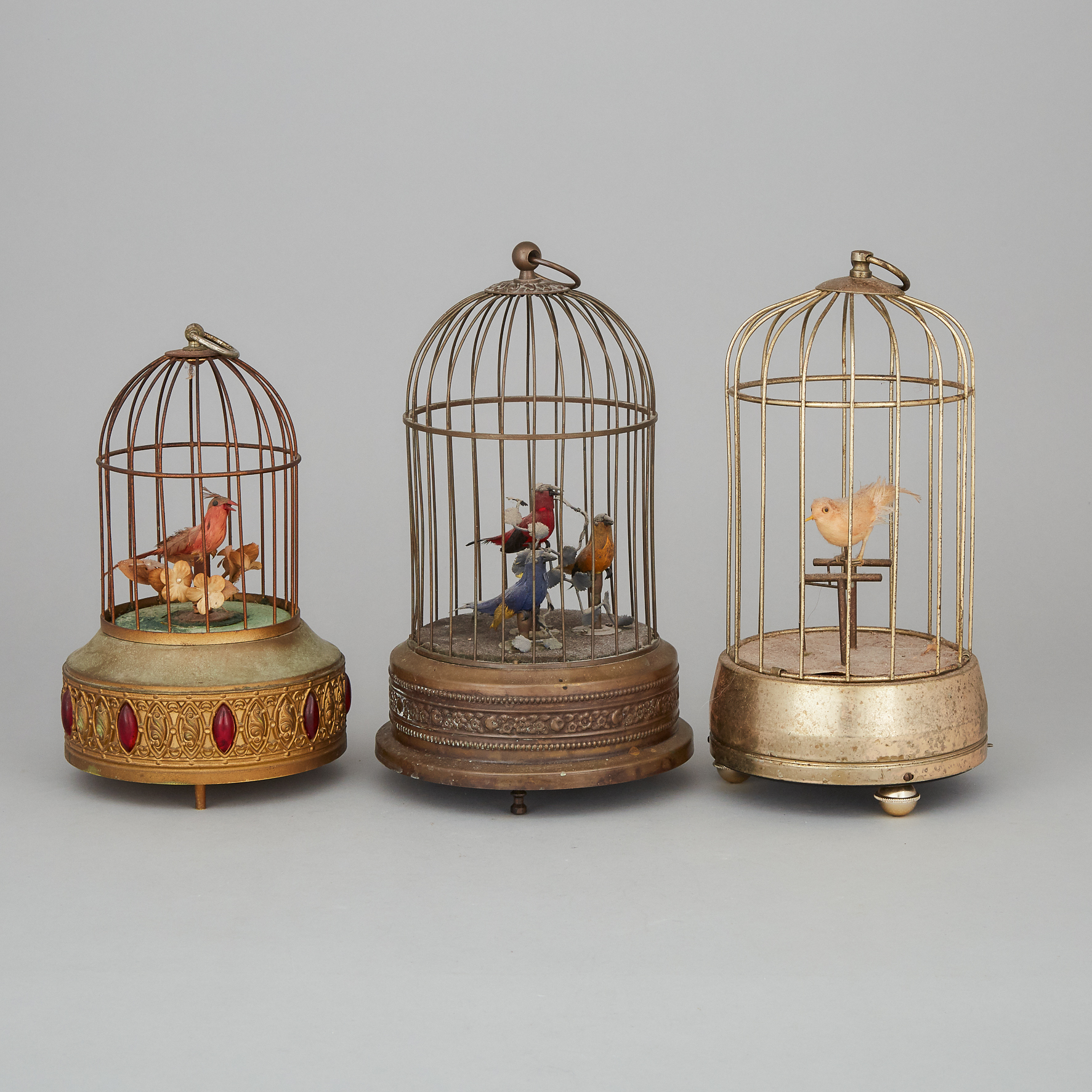 Group of Three Swiss or German Automaton Singing Birds in Cages, early-mid 20th century